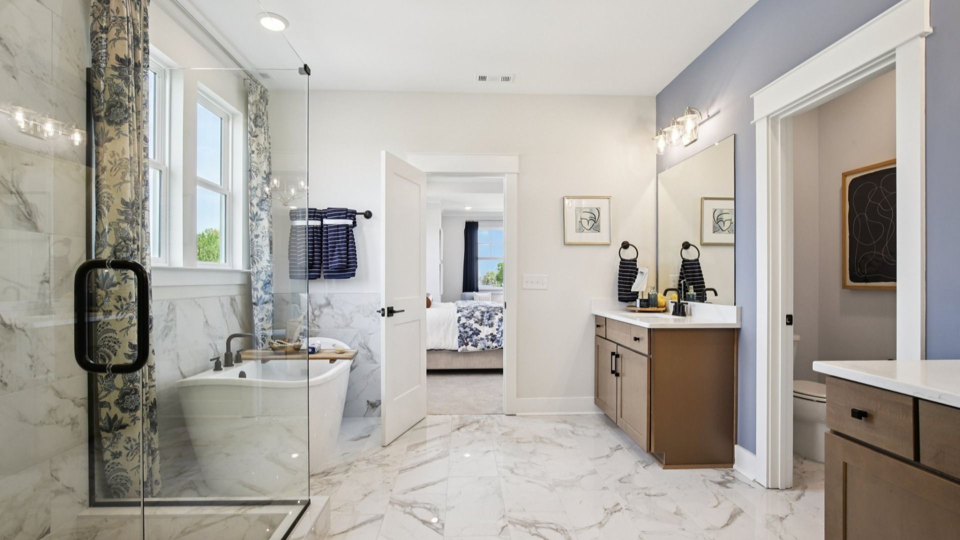 View of primary suite from bathroom