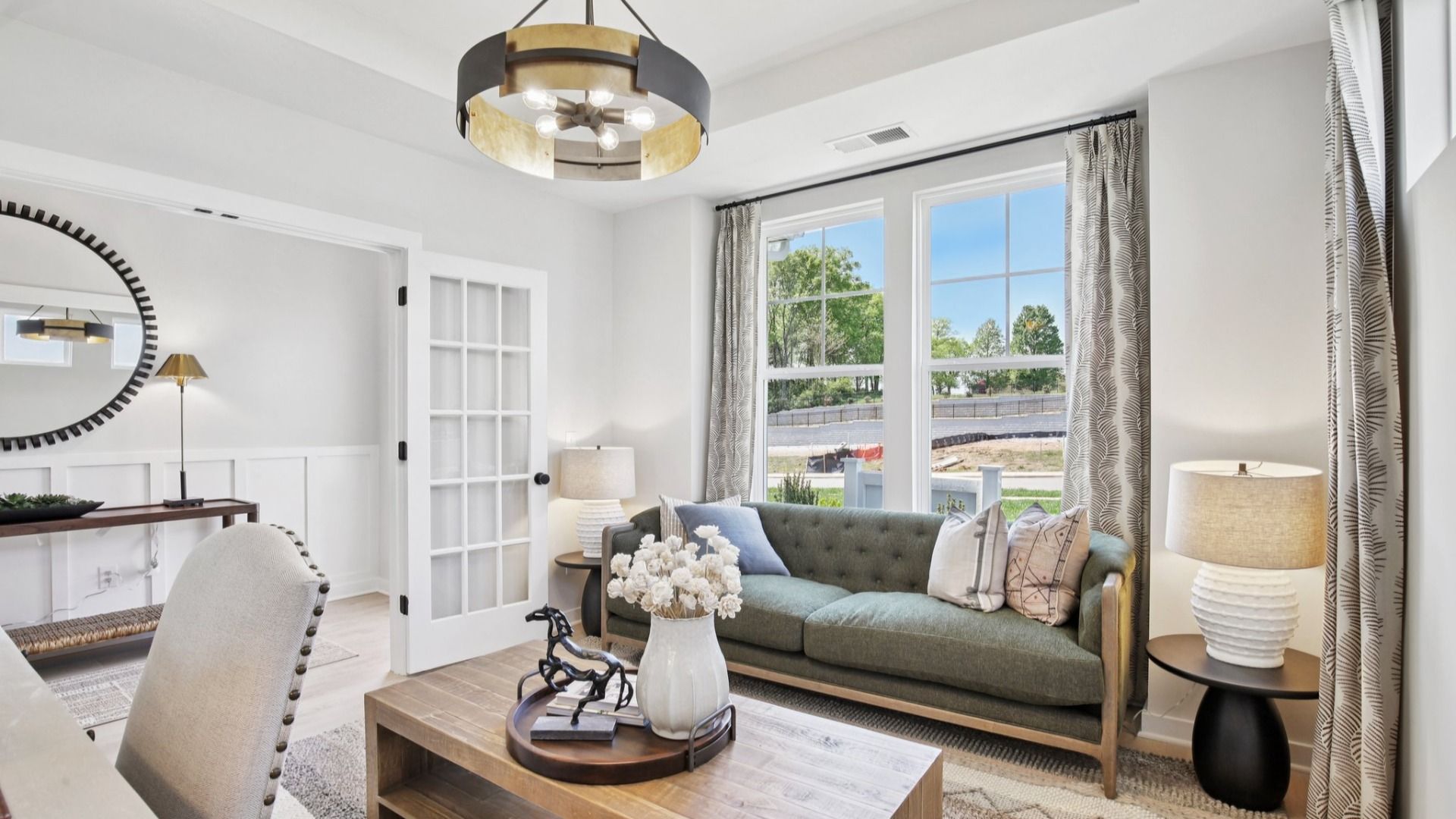 Dedicated study at front of home with seating area