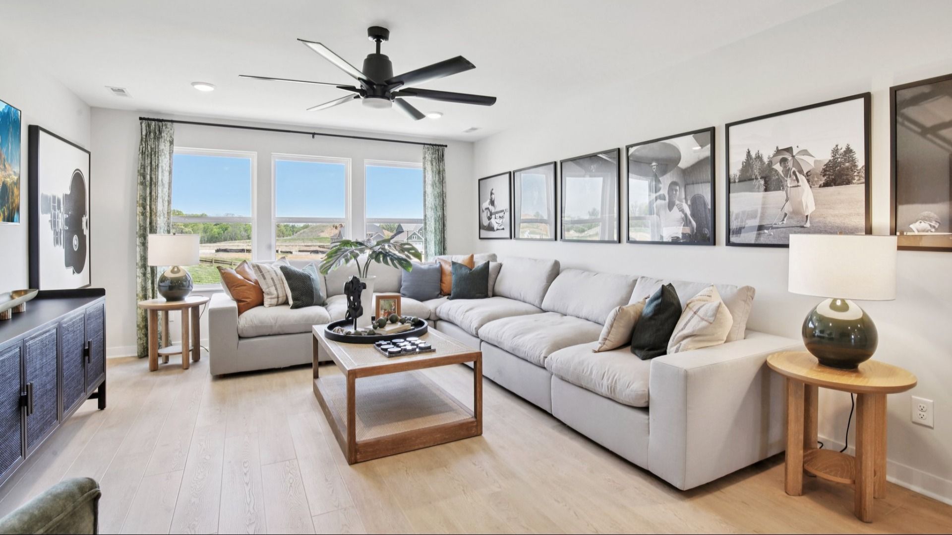 Large bonus room for movie and game nights with bright windows and large sectional