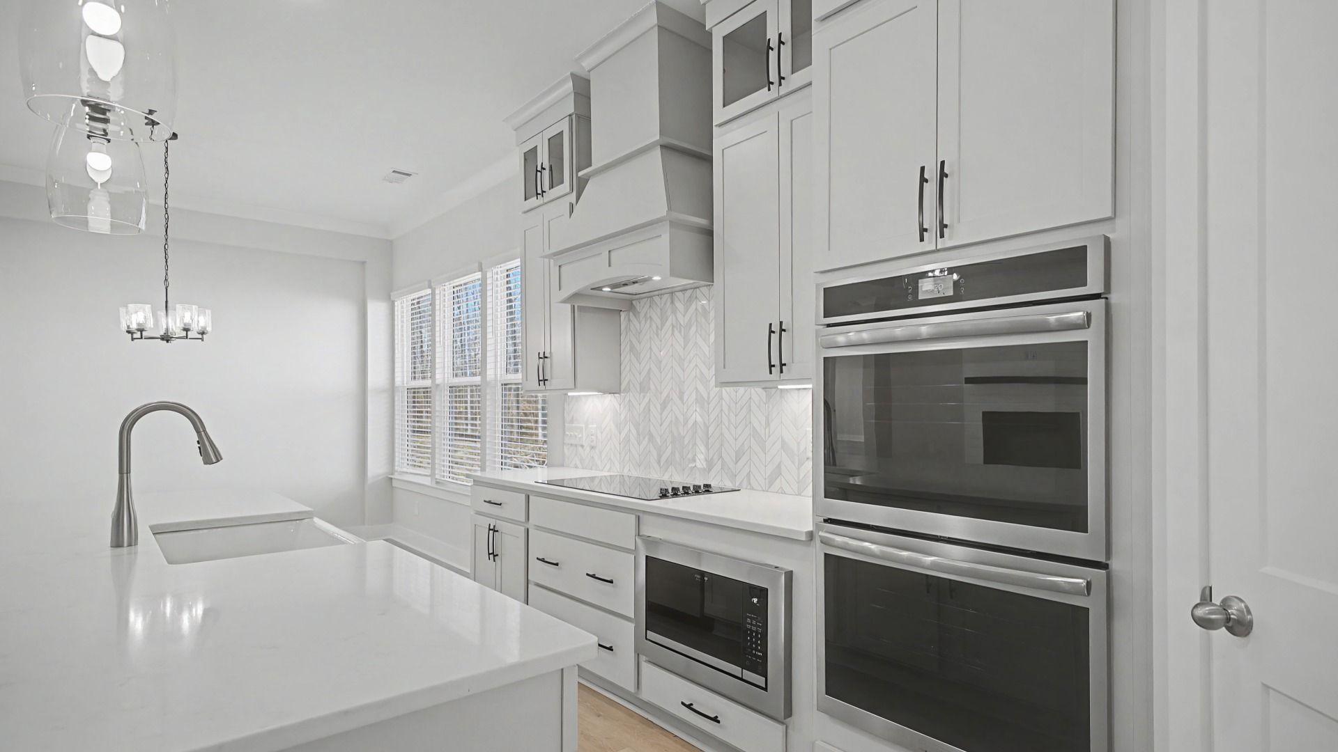 Double wall oven and upgraded range with hood