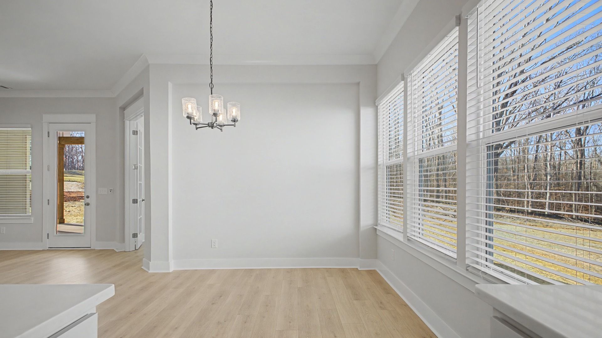 Dining area set near bright windows
