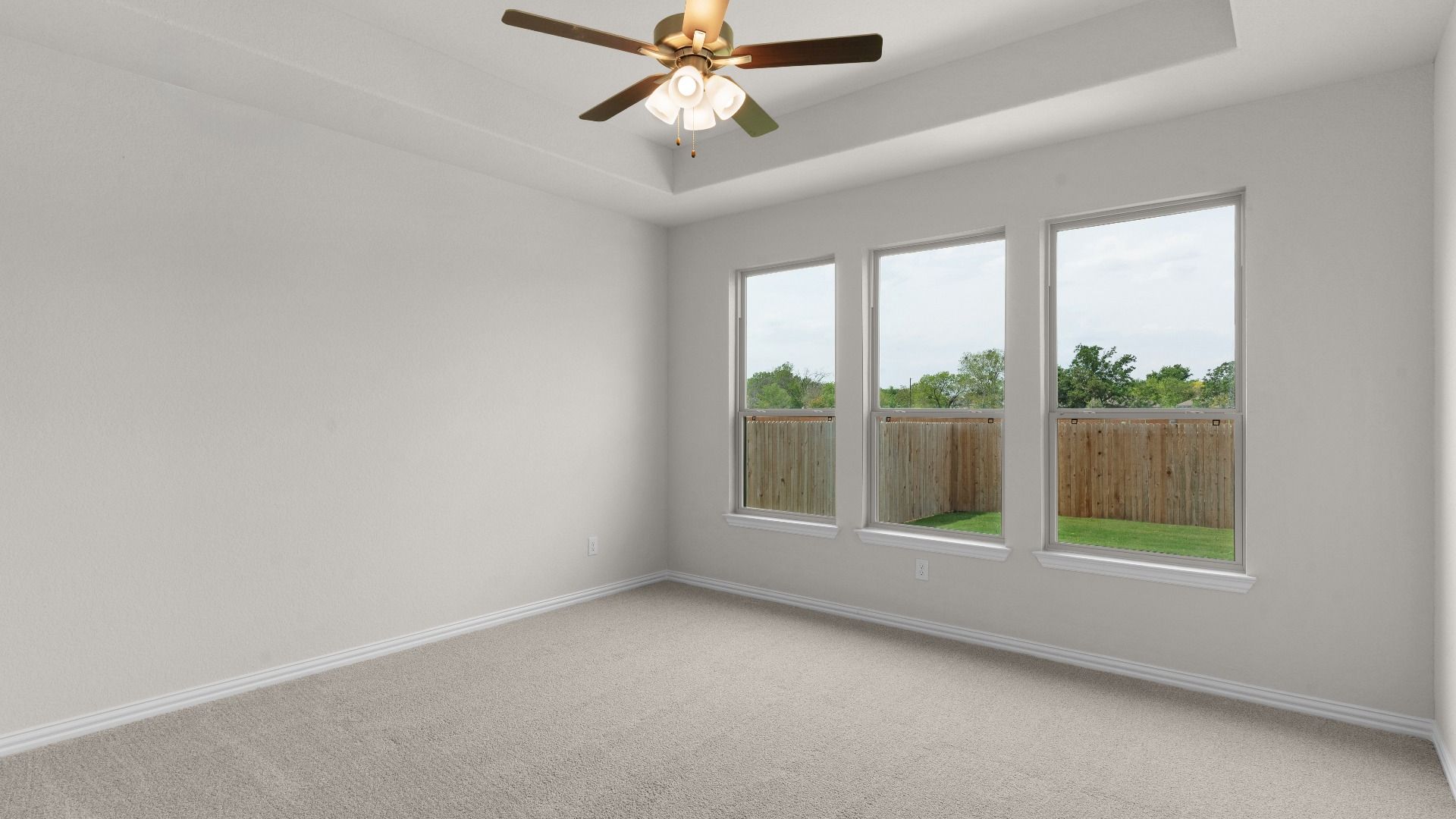 Owner's Suite with Ceiling Fan & Raised Ceiling