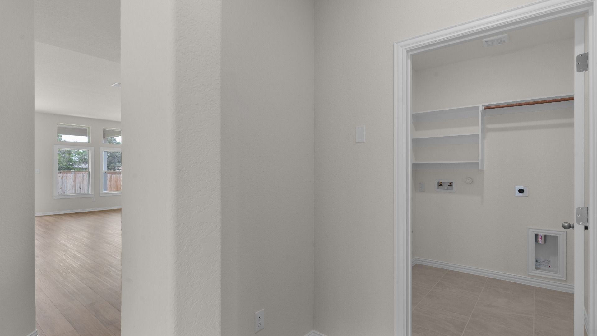 Laundry Room with Built-In Shelving