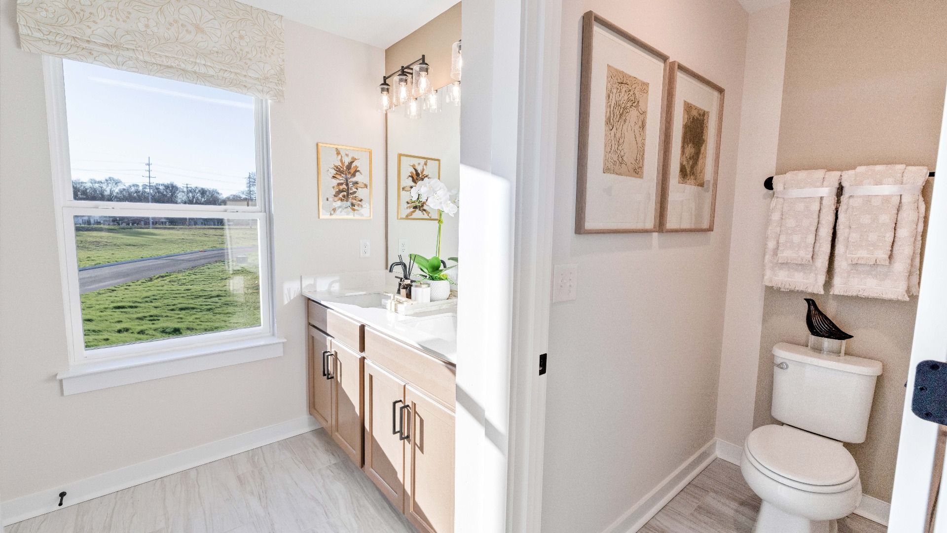 Dual Vanity with two sinks and dedicated water closet