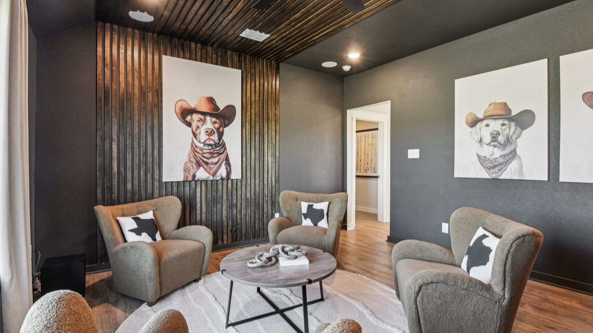 Game Room Area located behind the kitchen, featuring an additional closet and a ceiling fan