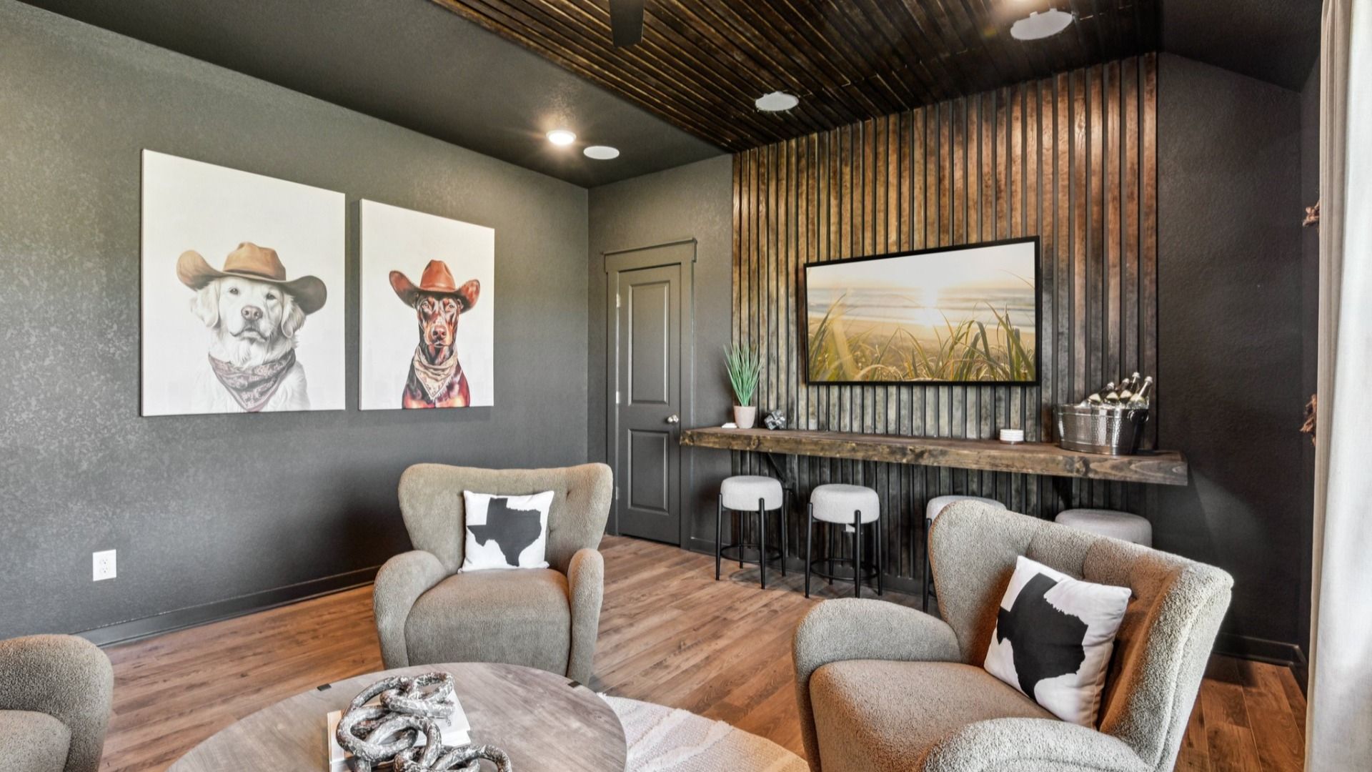 Game Room Area located behind the kitchen, featuring an additional closet and a ceiling fan