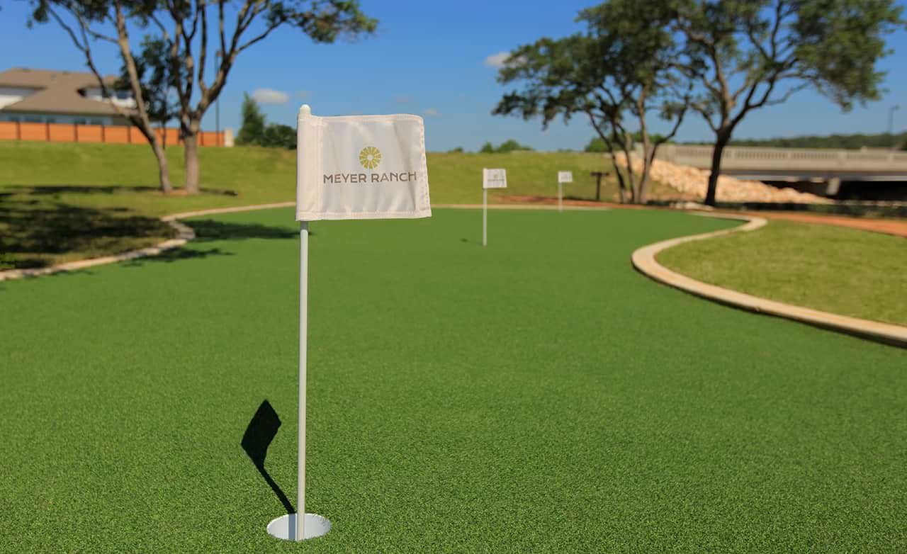 Experience refined leisure on the manicured putting green at Meyer Ranch's exclusive enclave, Texas.