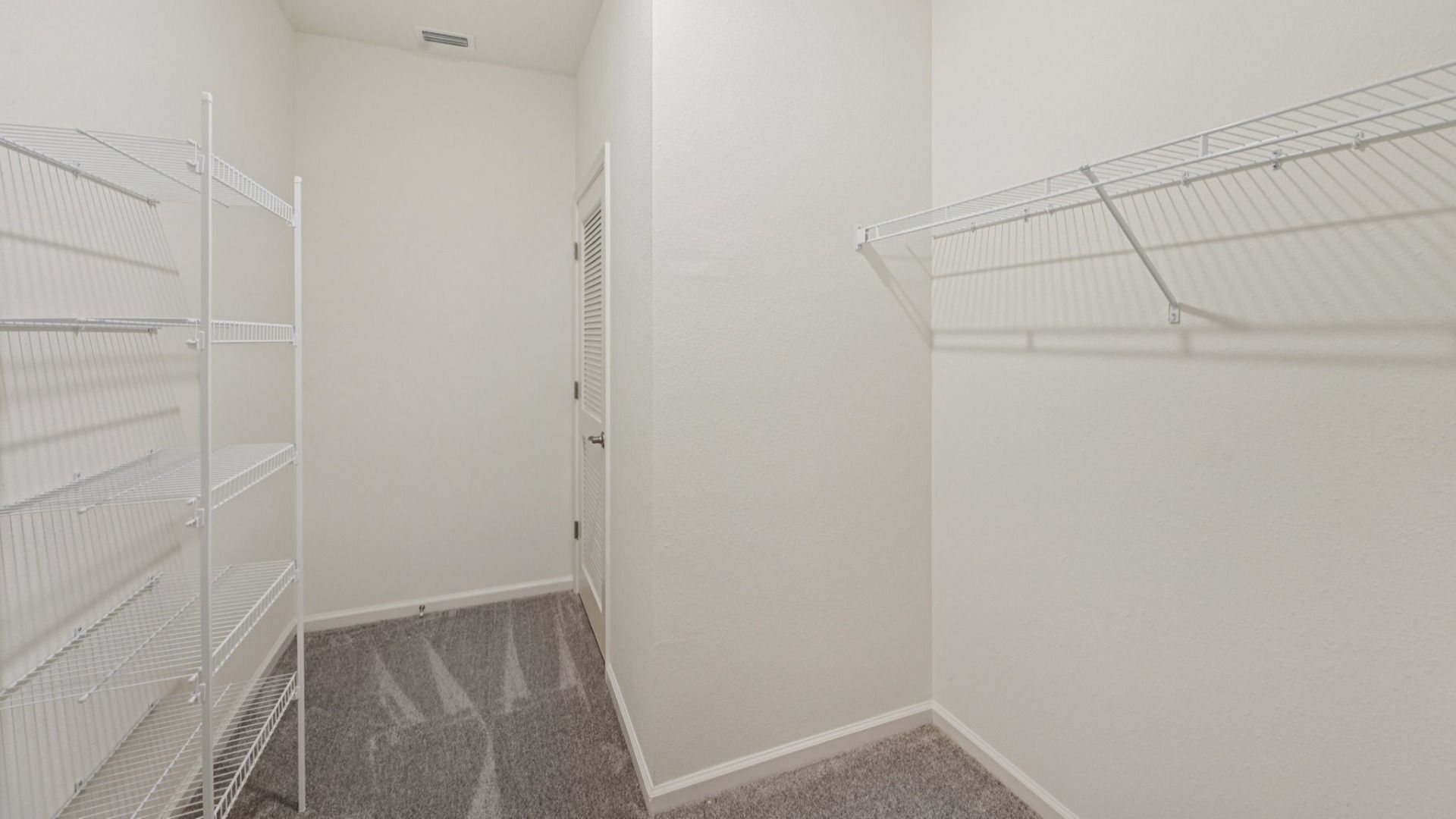 The Fleetwood Floor Plan Primary Suite walk-in closet by DRB Homes in Panther Creek New Jacksonville Home Community