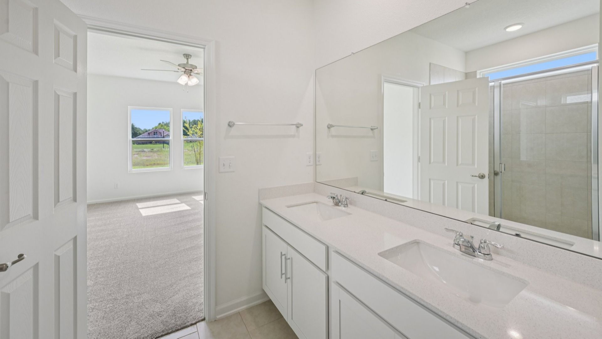 The Fleetwood Floor Plan Primary Suite Bath with Dual Sinks by DRB Homes in Panther Creek New Jacksonville Home Community