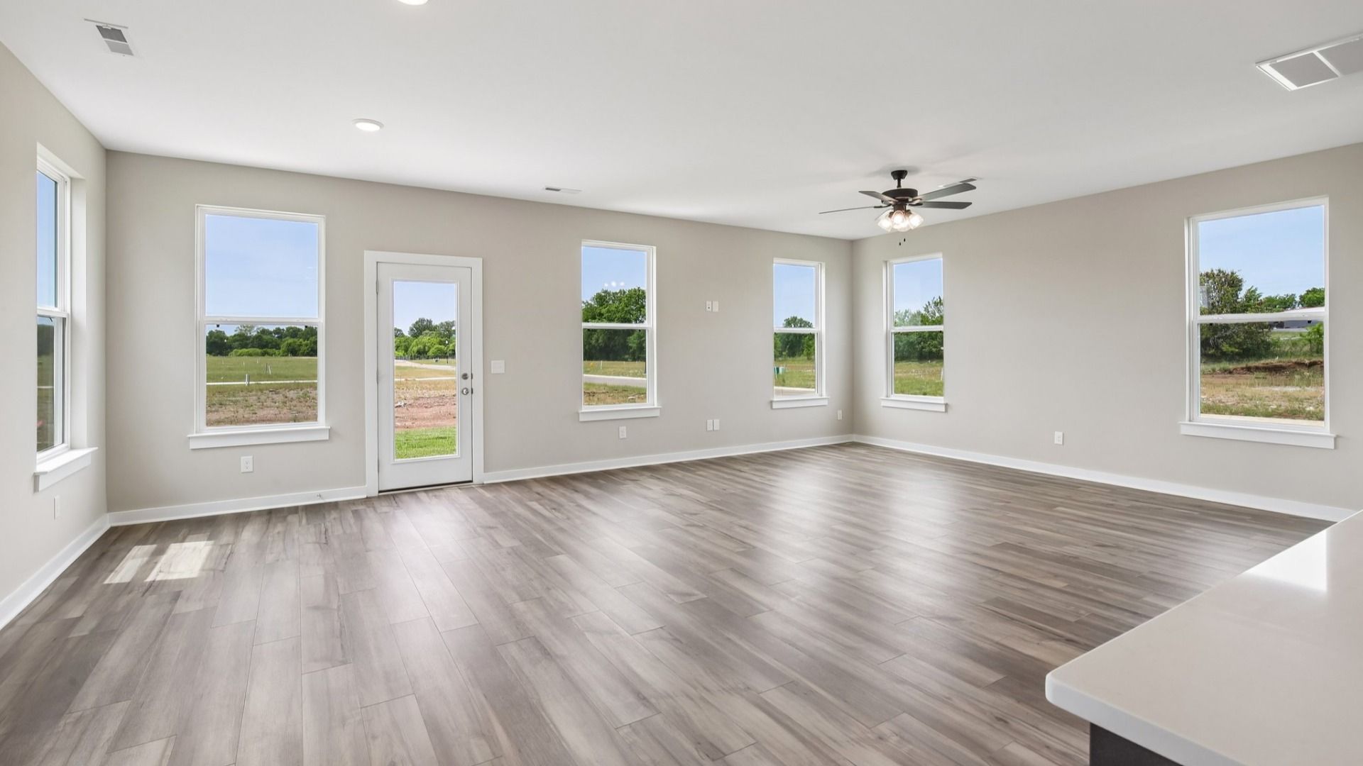 First Floor with hard surface flooring and bright natural light through windows