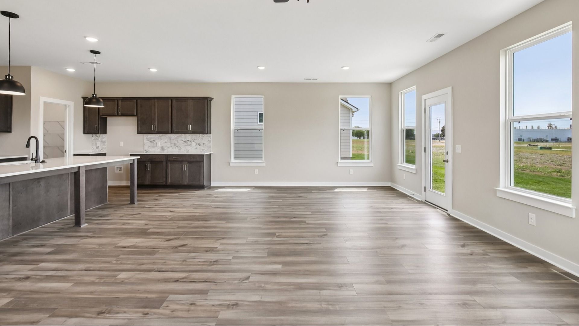 Image of First Floor with hard surface flooring and kitchen