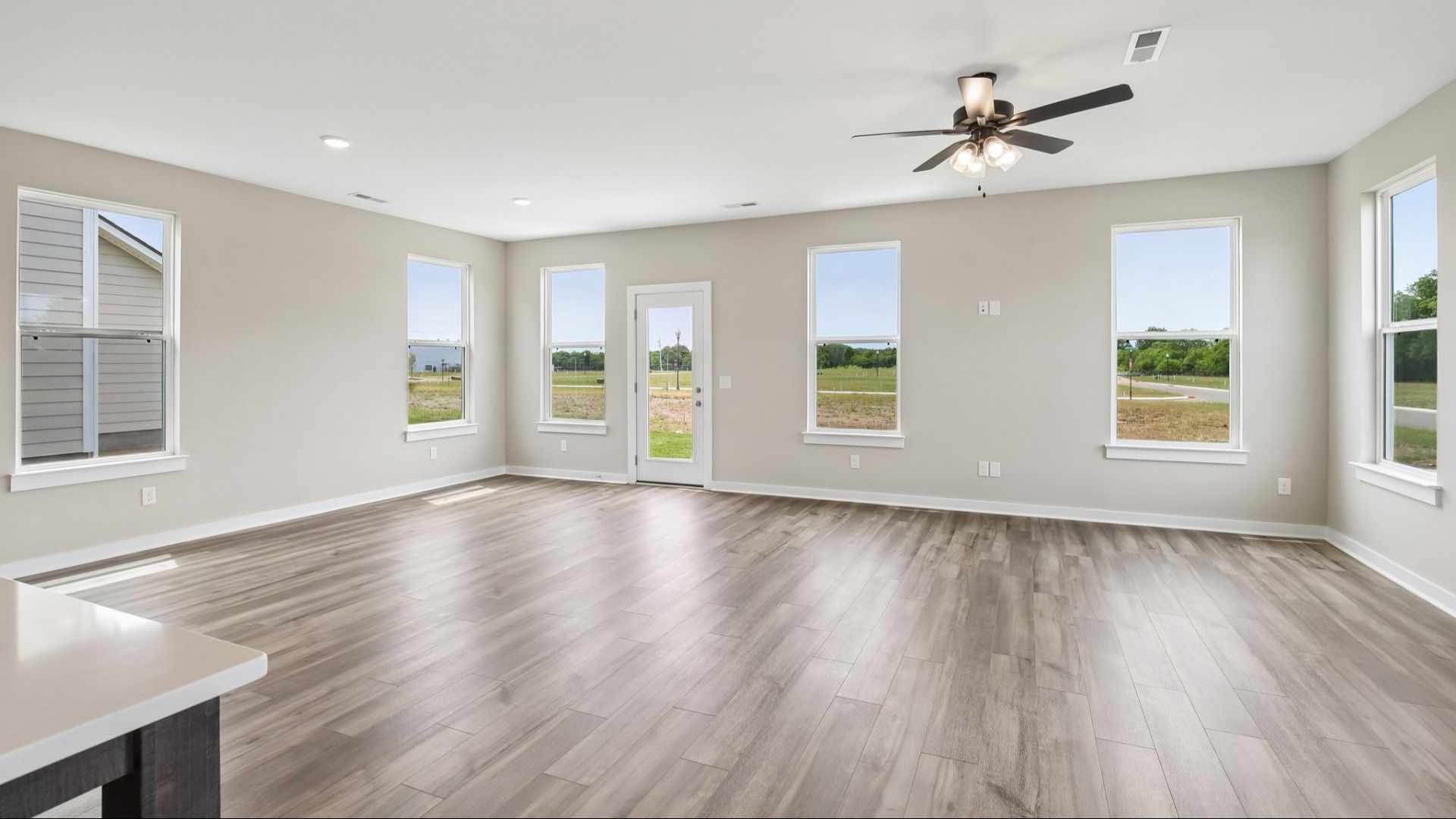 Image of First Floor with hard surface flooring and bright natural light through windows