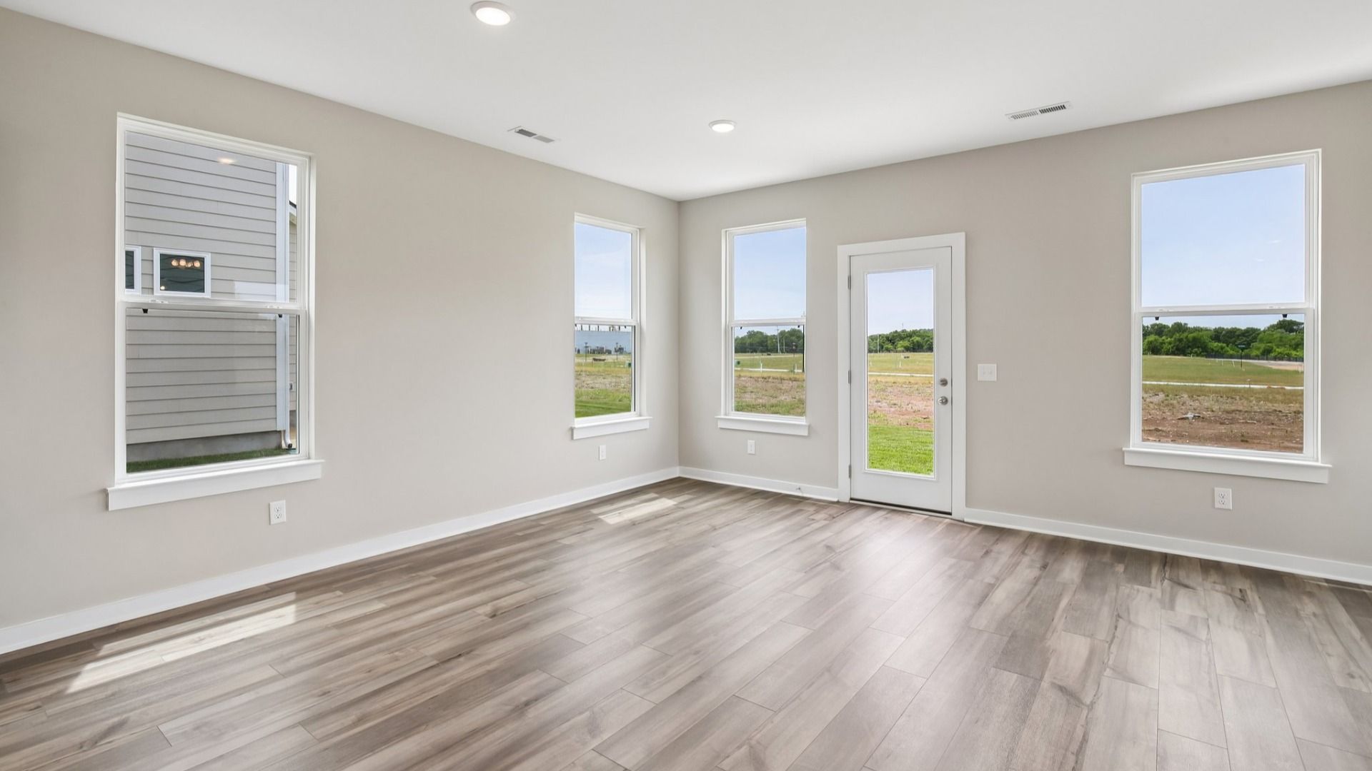 Dining Nook next to kitchen and rear door