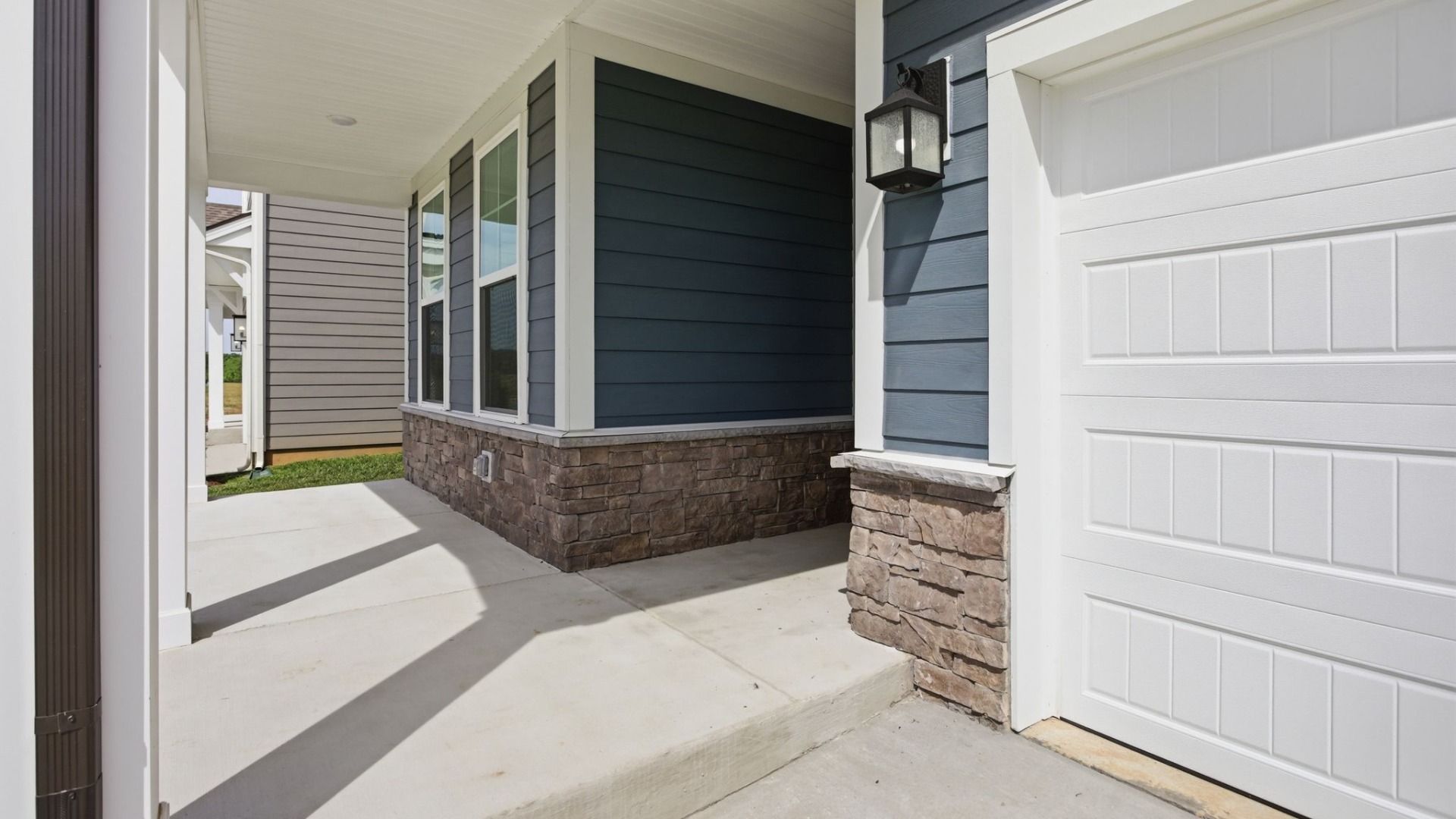 Covered entry with porch light