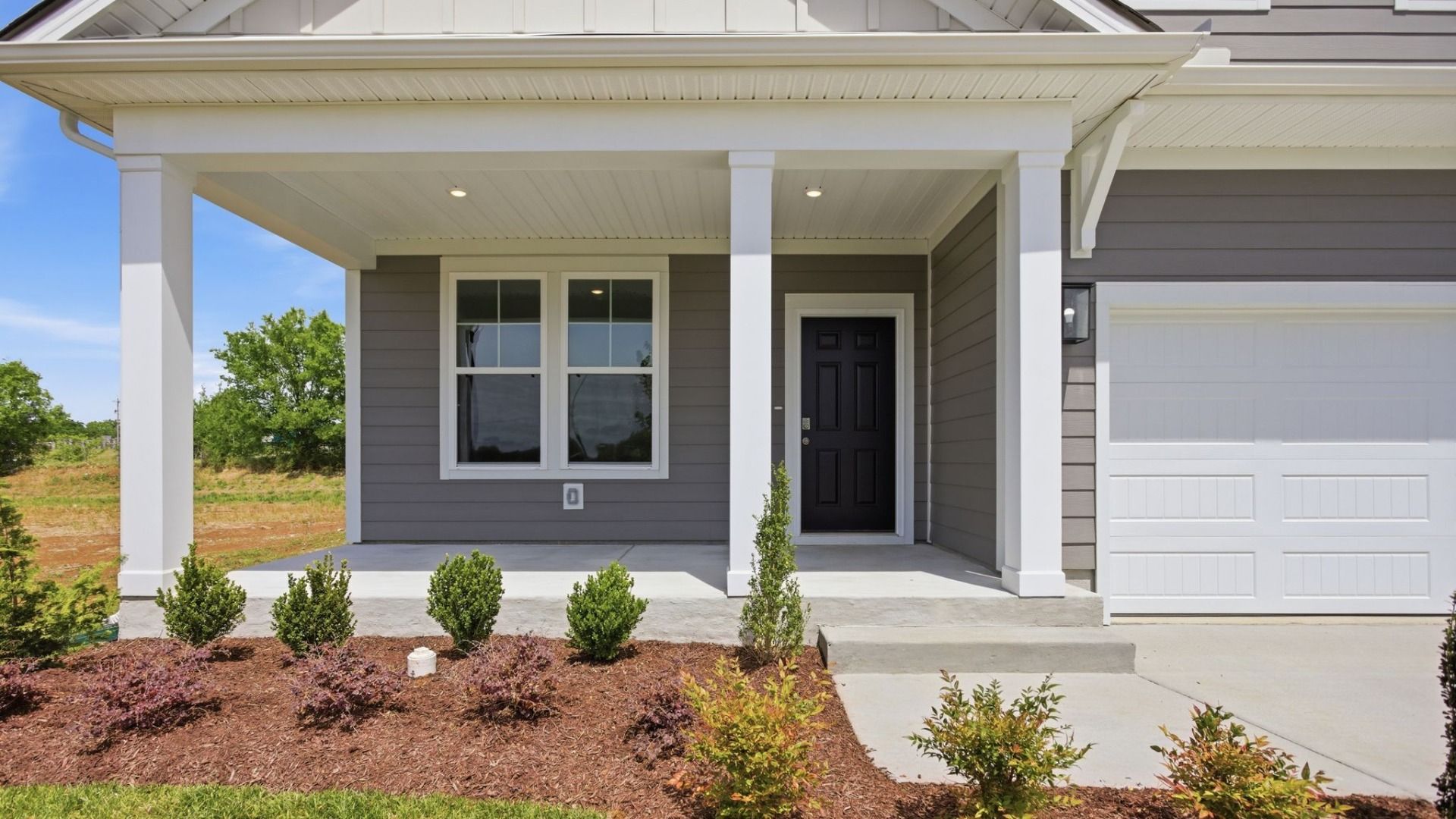 Exterior entryway with black door