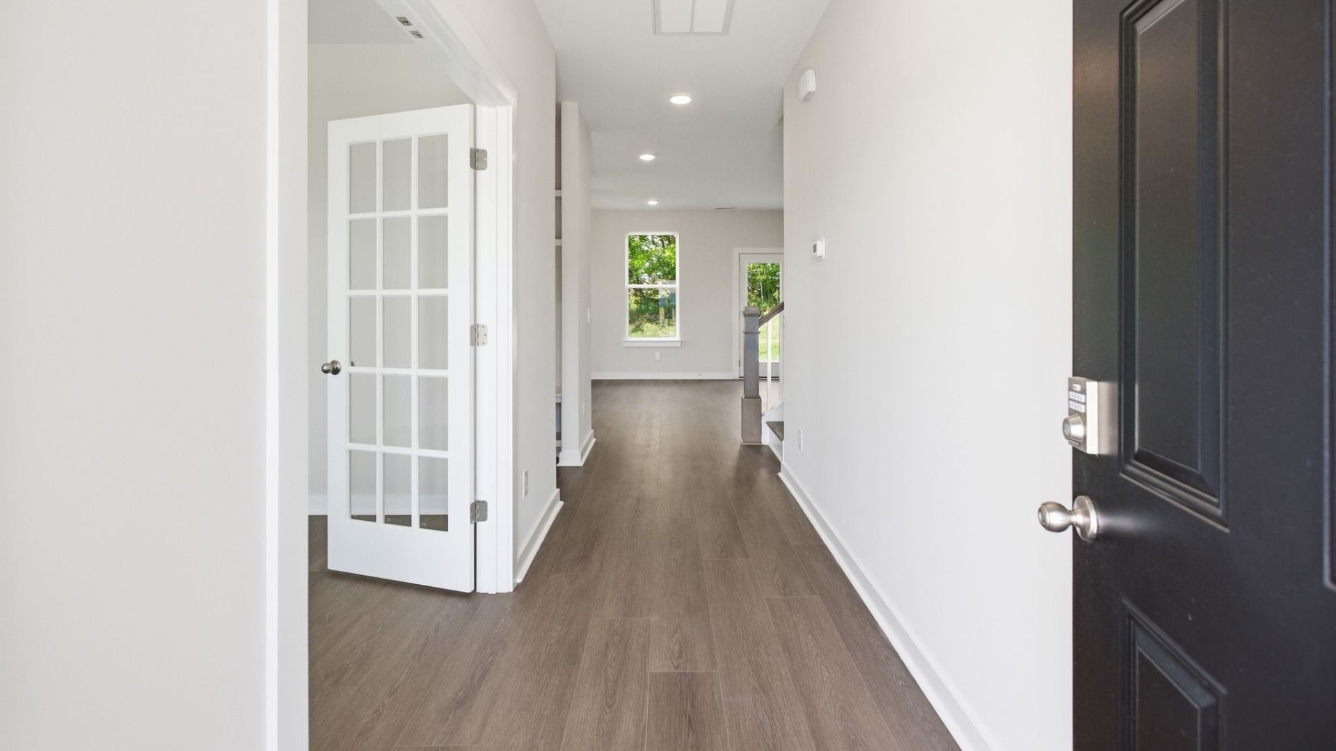 Front door entry to home with access to study