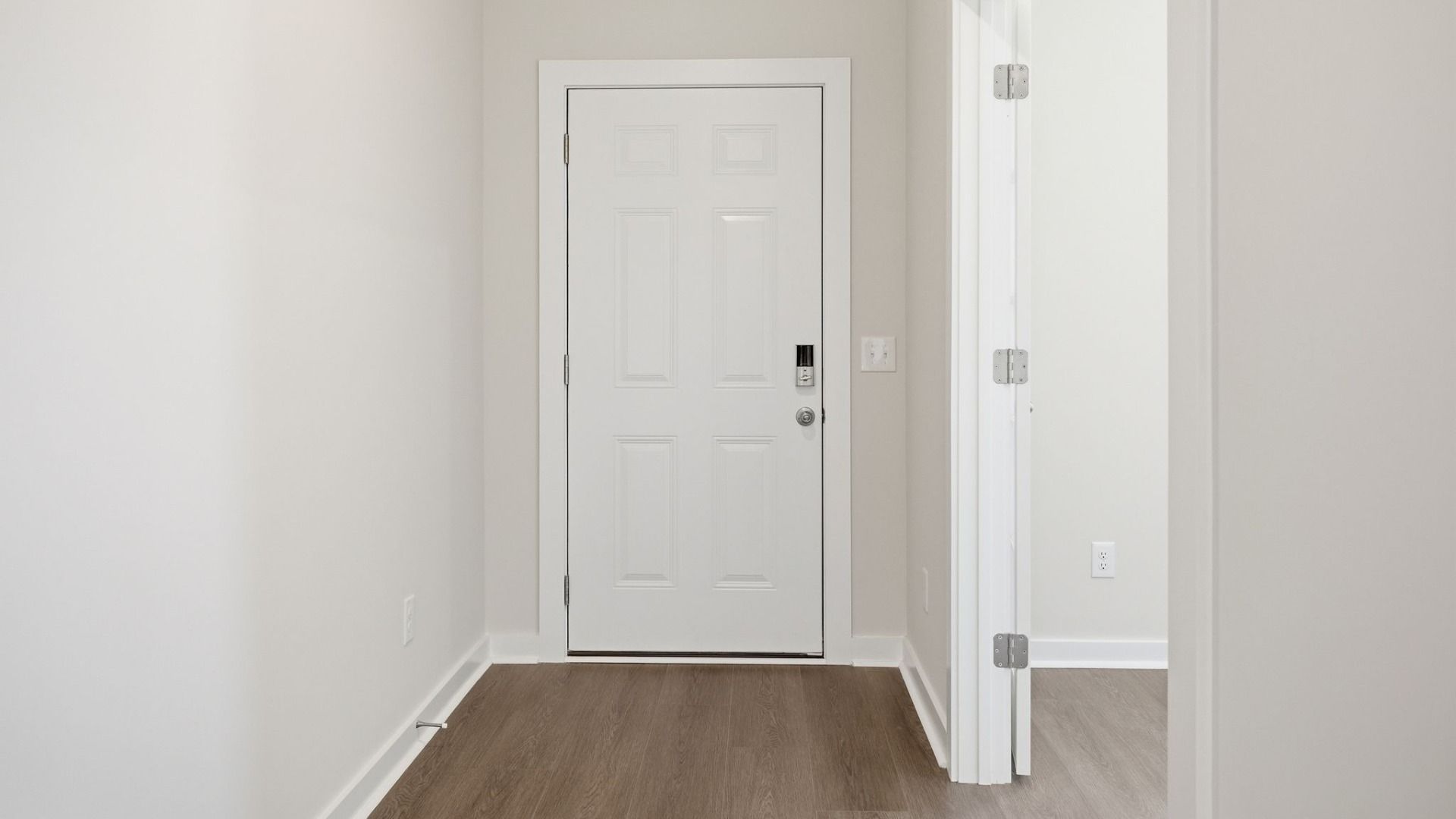 Front door entry to home with access to study