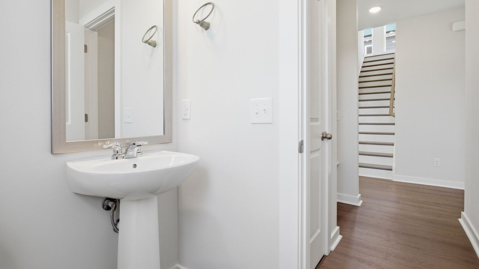 Powder room with nearby stairs