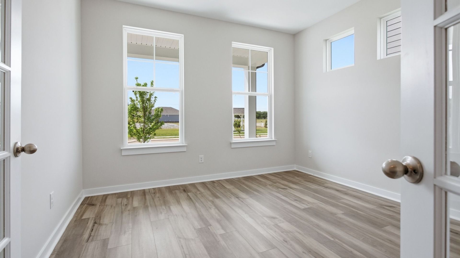 Study with two windows and French doors