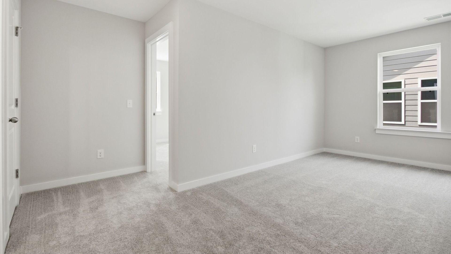 Second Floor Loft area with closet, window, and access to secondary bedroom