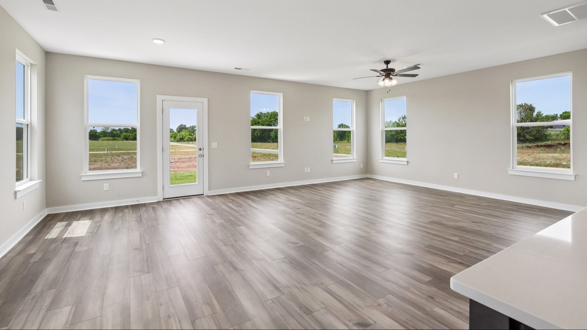 First Floor with hard surface flooring and bright natural light through windows