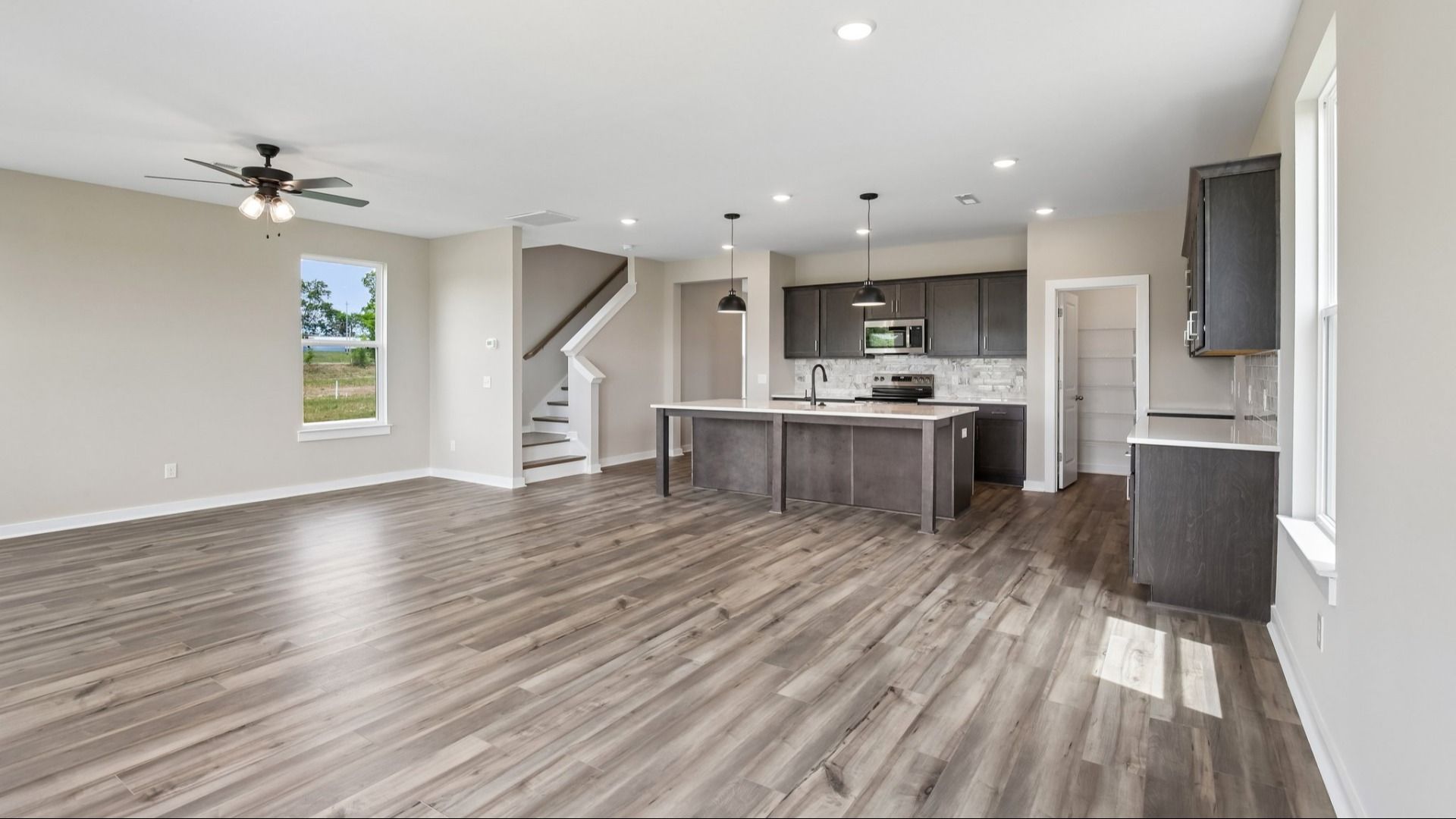 First Floor with hard surface flooring and kitchen
