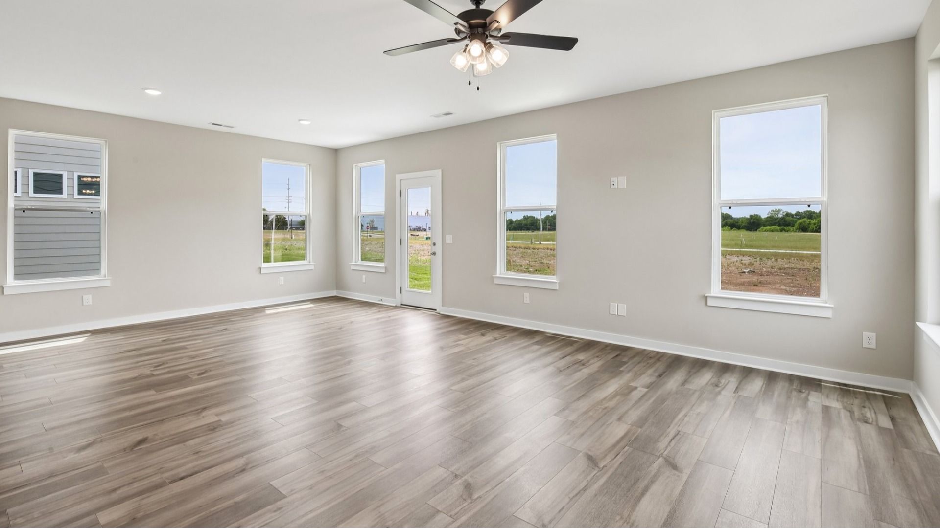 First Floor with hard surface flooring and bright natural light through windows