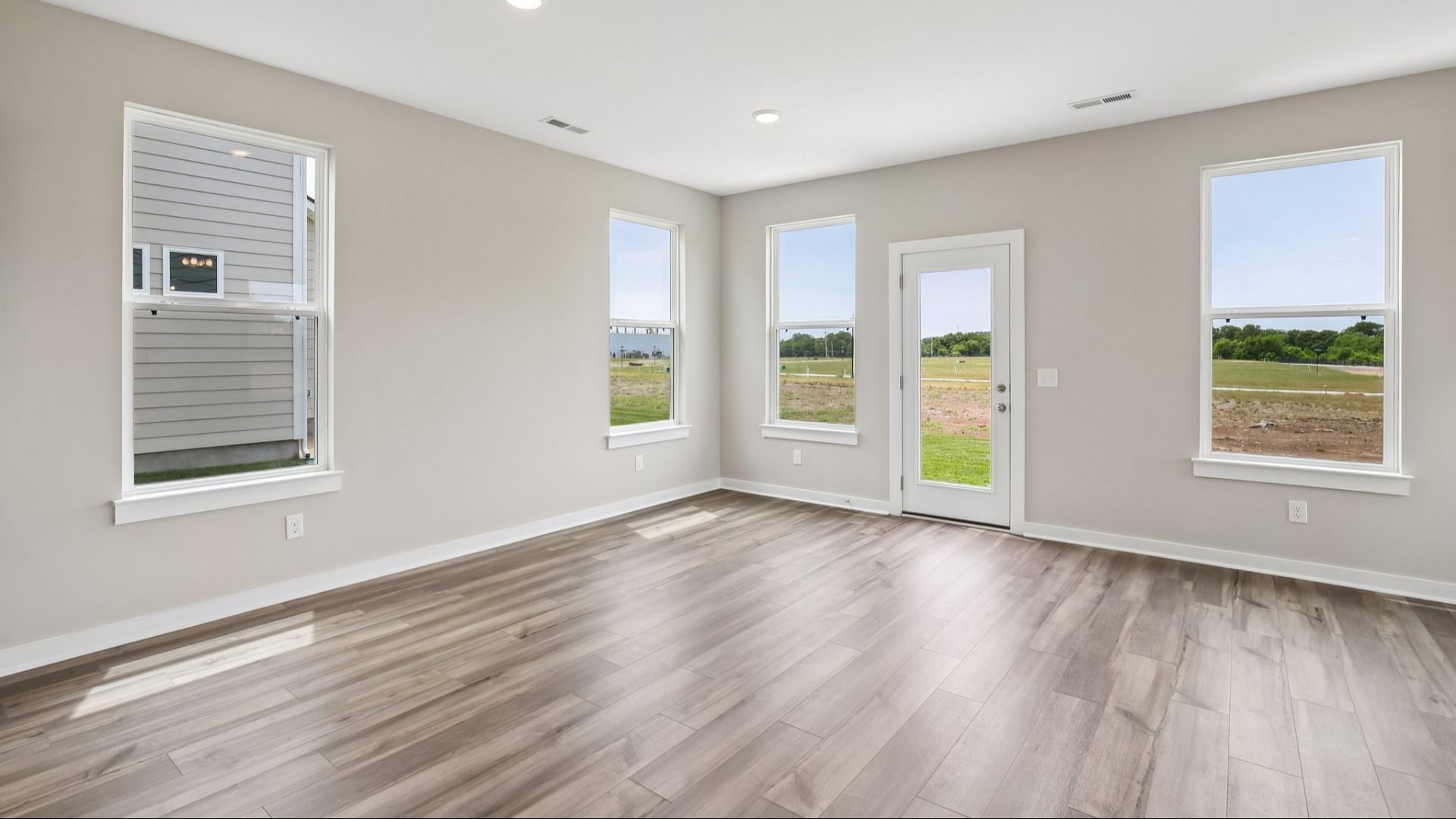 Dining Nook next to kitchen and rear door