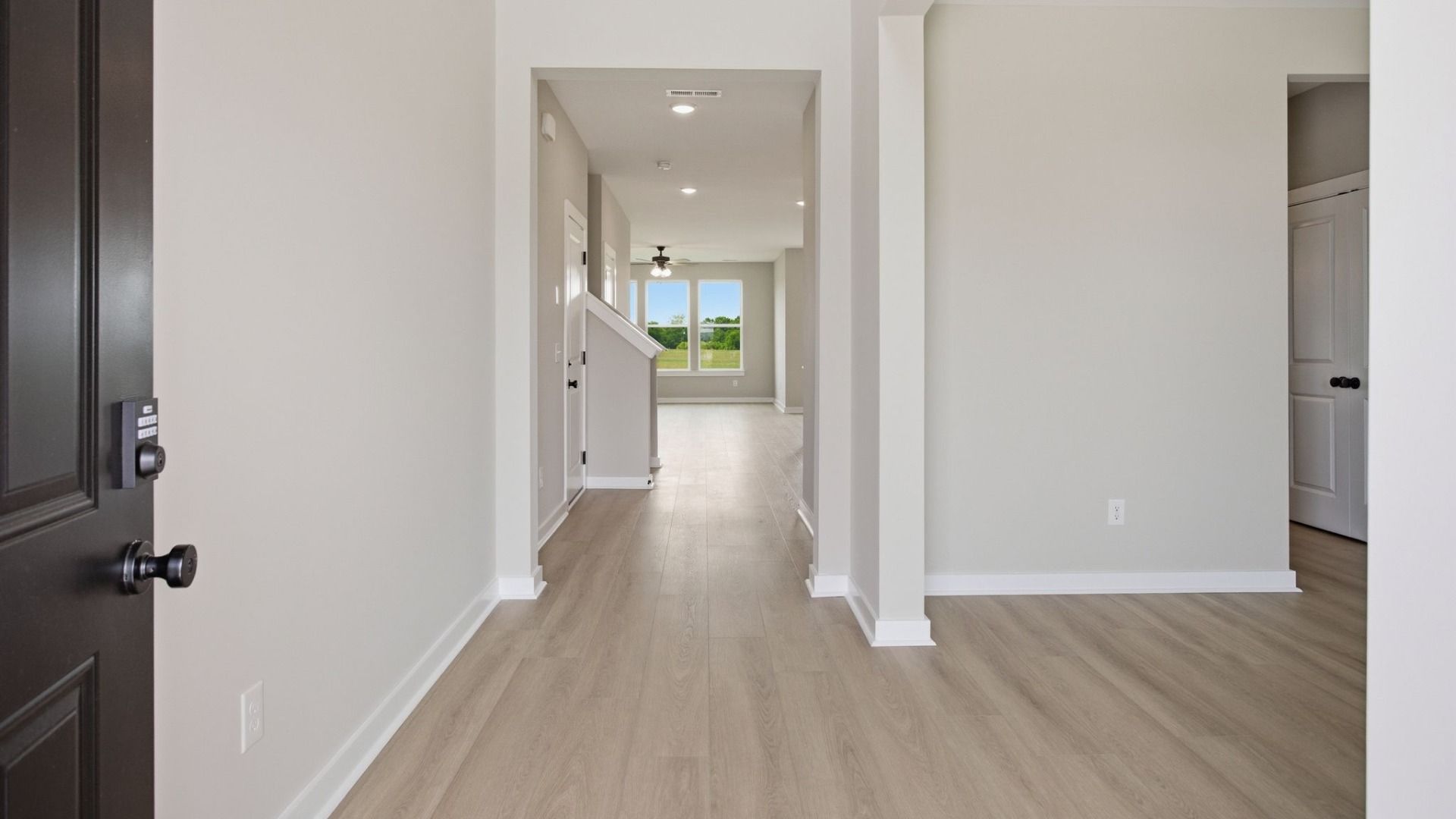 Front entryway to home with hard surface flooring