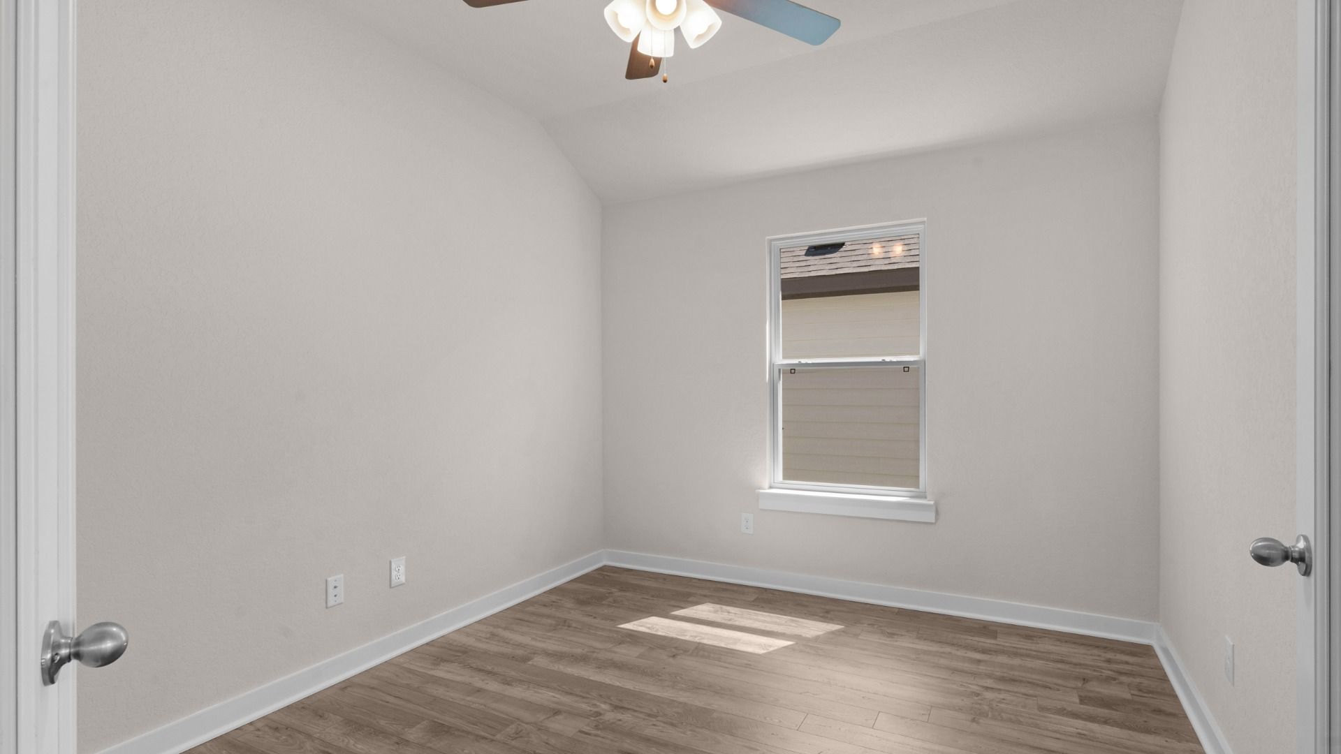Private dedicated office with a ceiling fan, offering a quiet and comfortable workspace.