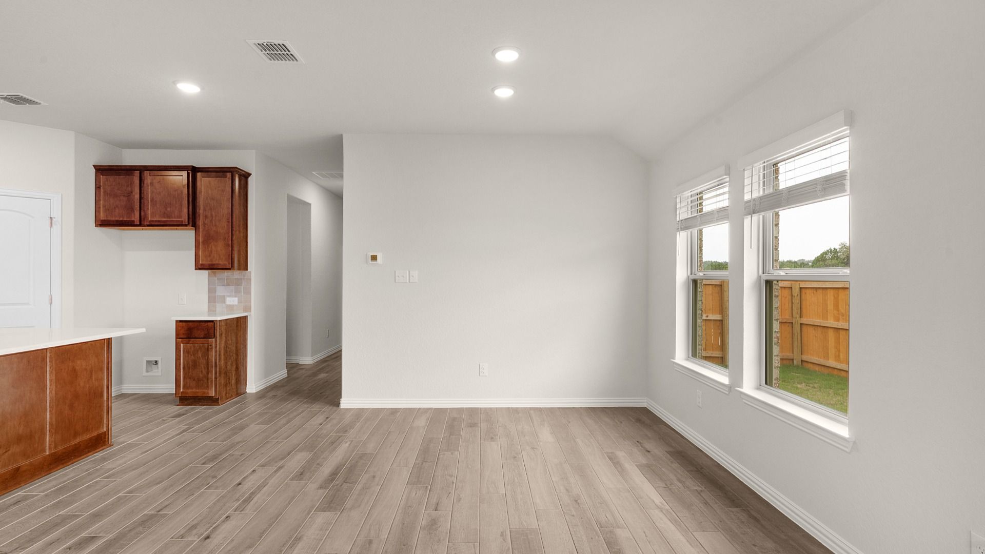 Casual dining area opens to kitchen, creating a seamless flow for easy meals and everyday living.