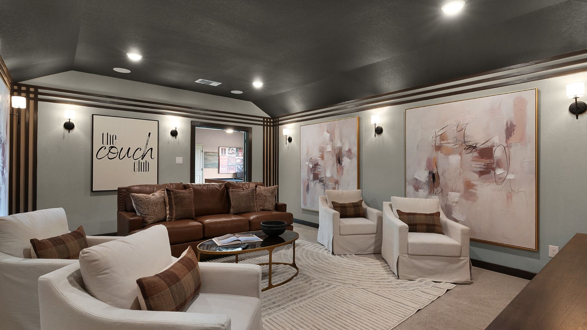 Dedicated media room designed for immersive entertainment and cozy viewing experiences.