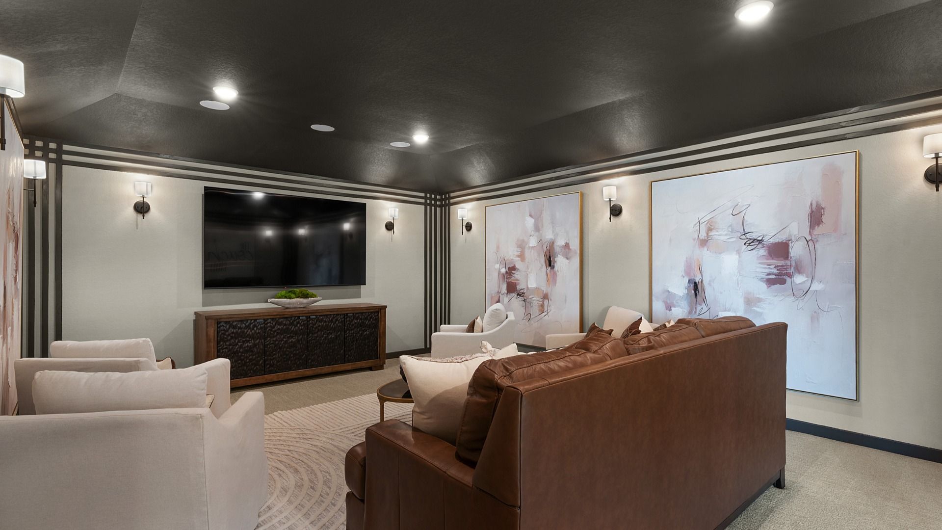 Dedicated media room designed for immersive entertainment and cozy viewing experiences.