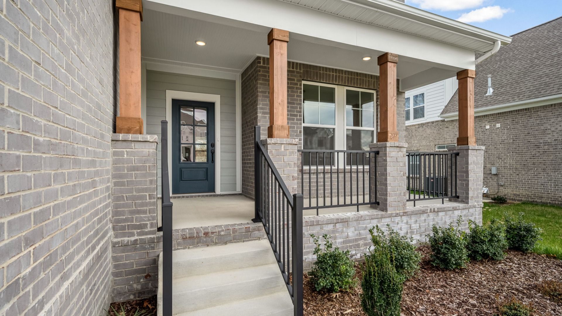 Front entryway with blue door