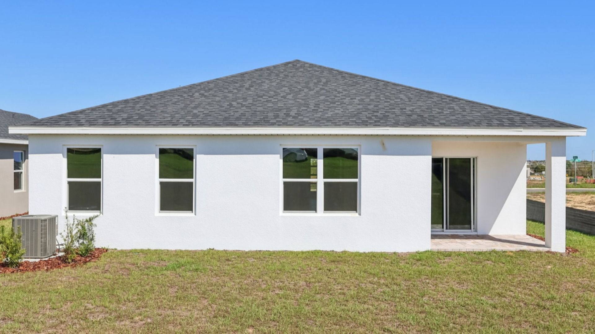 Atwood Floor Plan Rear Exterior by DRB Homes in Liberty Trace New Homes in Haines City, FL