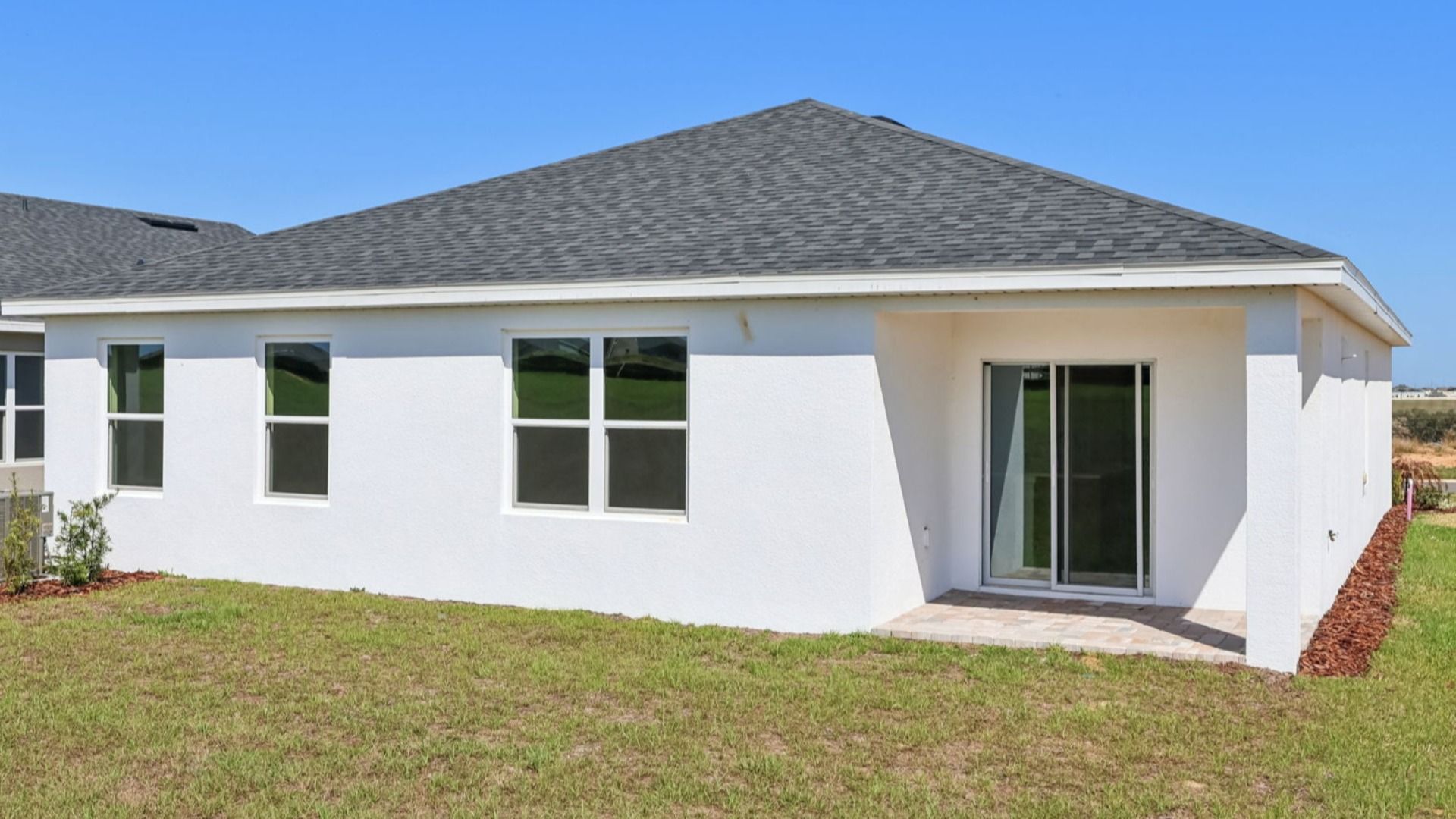 Atwood Floor Plan Rear Exterior by DRB Homes in Liberty Trace New Homes in Haines City, FL