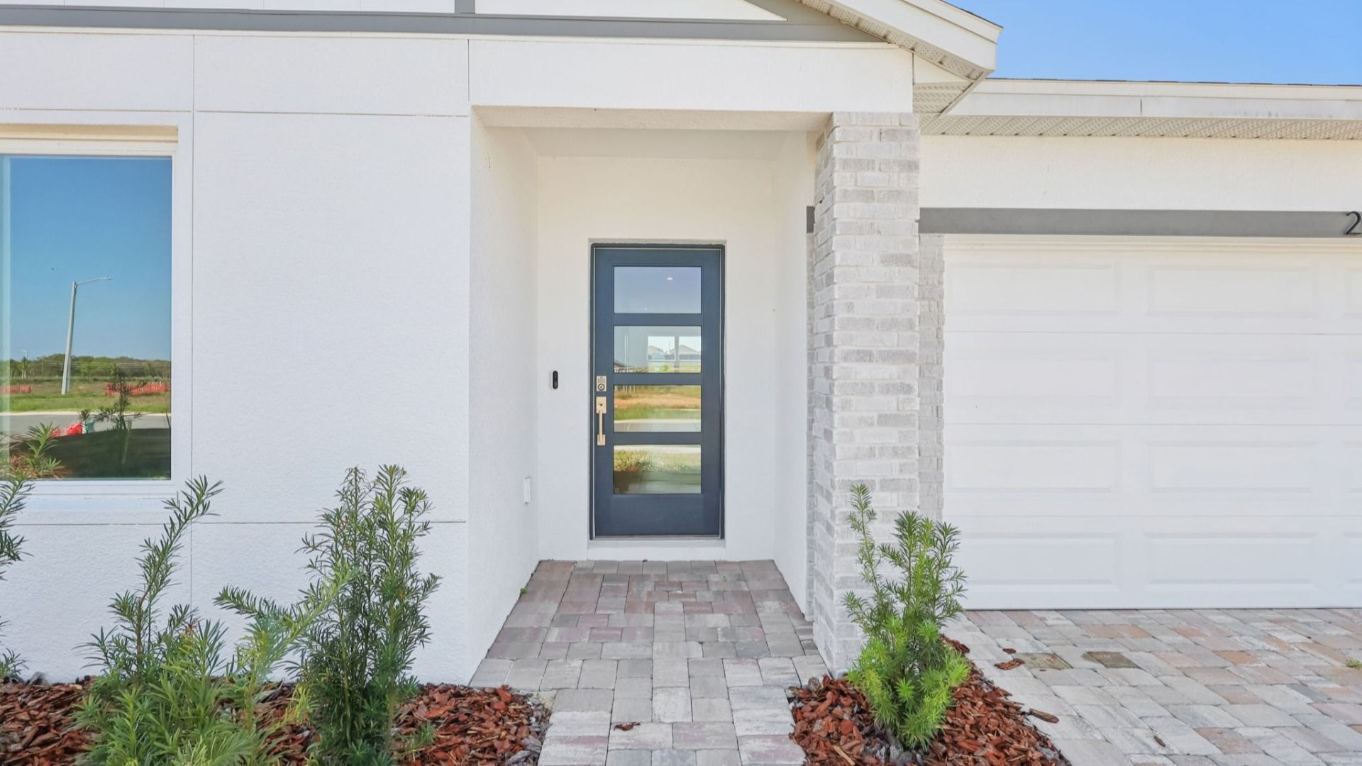 Atwood Floor Plan Exterior Front Entry by DRB Homes in Liberty Trace New Homes in Haines City, FL