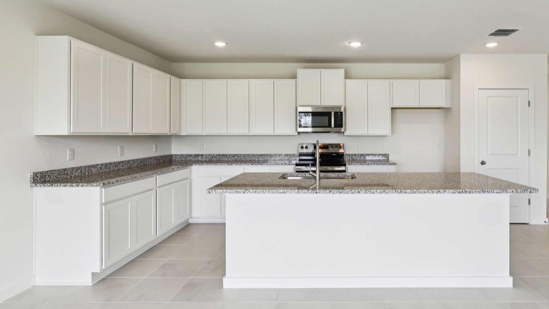 Kitchen of the Baker Floor Plan by DRB Homes in Liberty Trace New Homes in Haines City