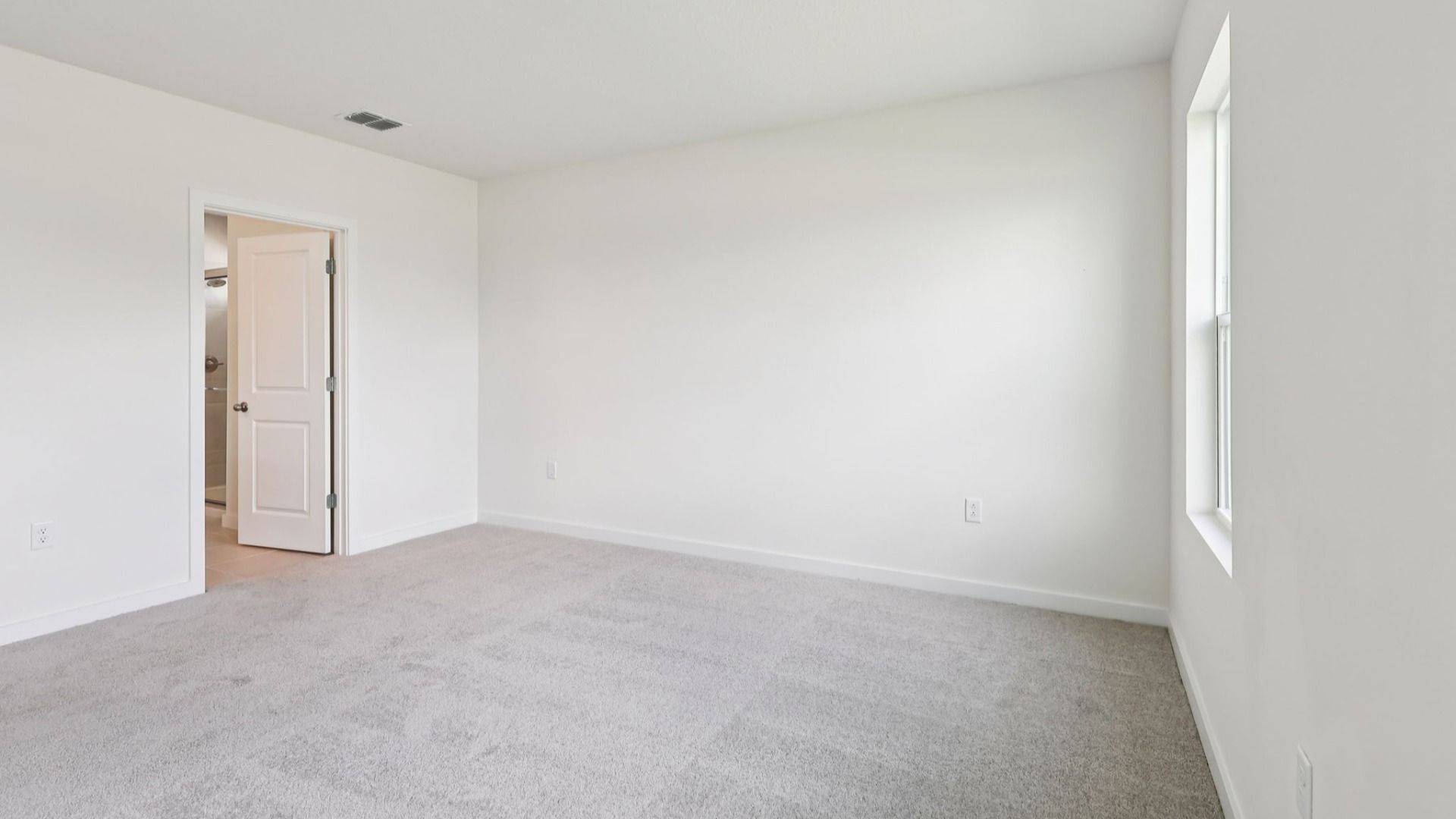 Primary Suite in the Baker Floor Plan by DRB Homes in Liberty Trace New Homes in Haines City