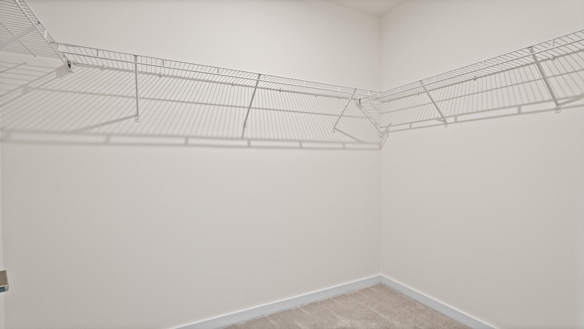 Atwood Large Primary Suite Walk-in Closet by DRB Homes in Liberty Trace New Homes in Haines City, FL