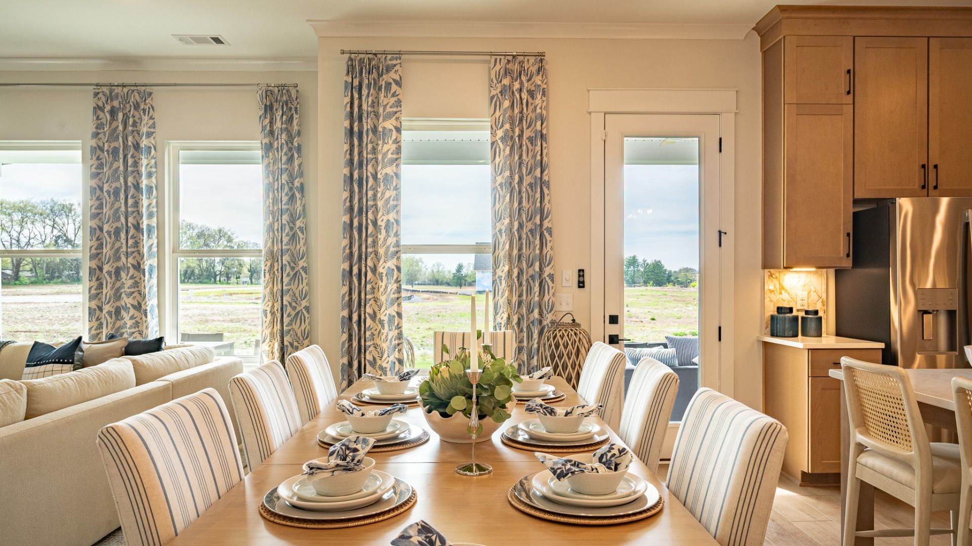 Spacious dining area with bright natural lighting from windows