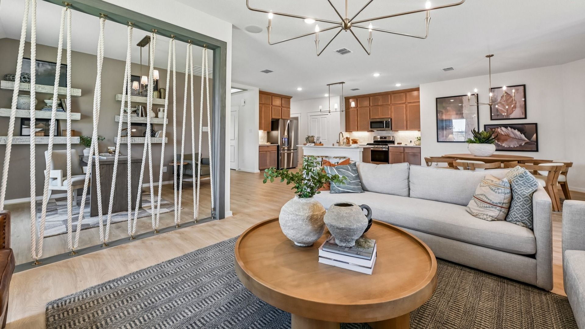 Exquisite design features include chic lighting, open layout, and premium finishes in Cielo community.