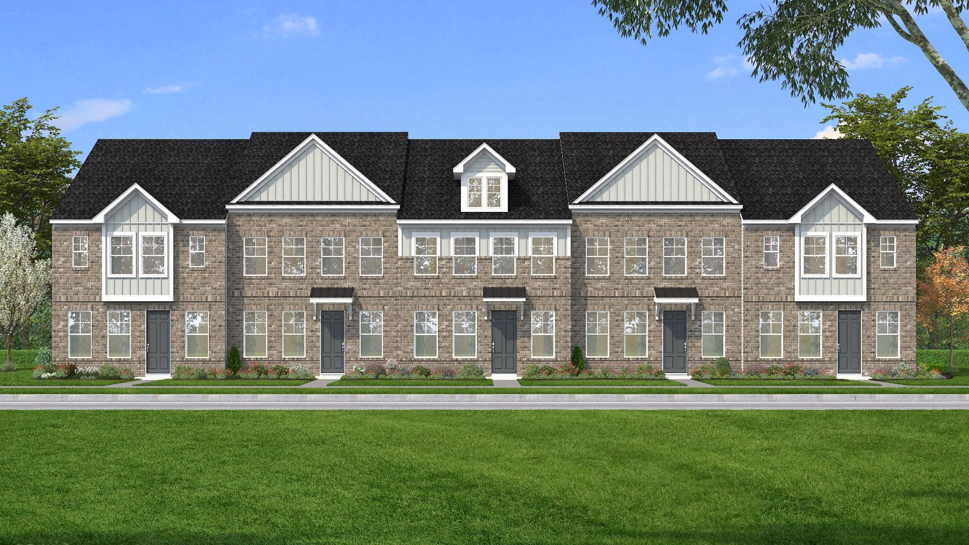 Townhome Exteriors with brick fronts and Hardie siding accents