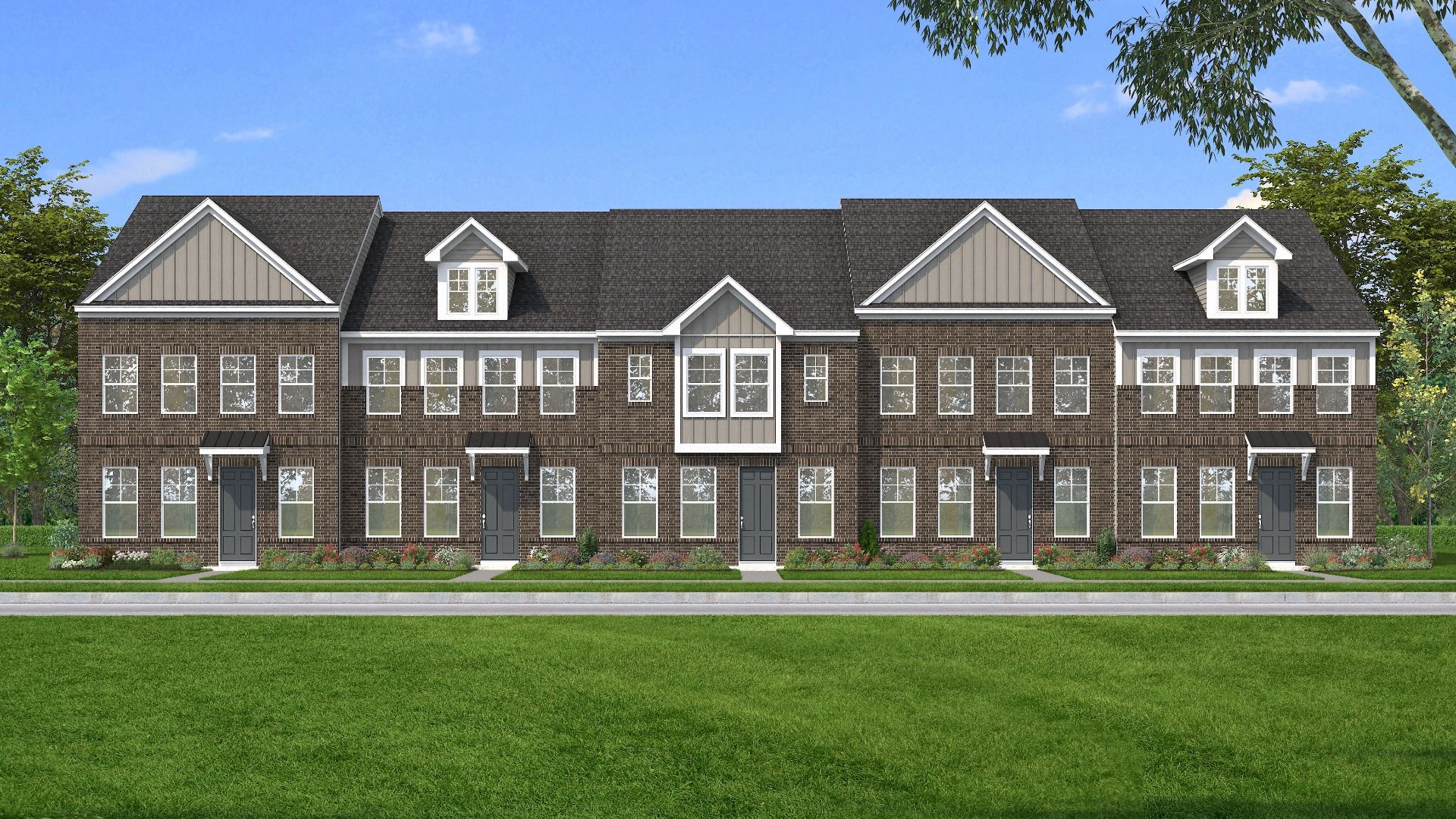 Townhome Exteriors with brick fronts and Hardie siding accents