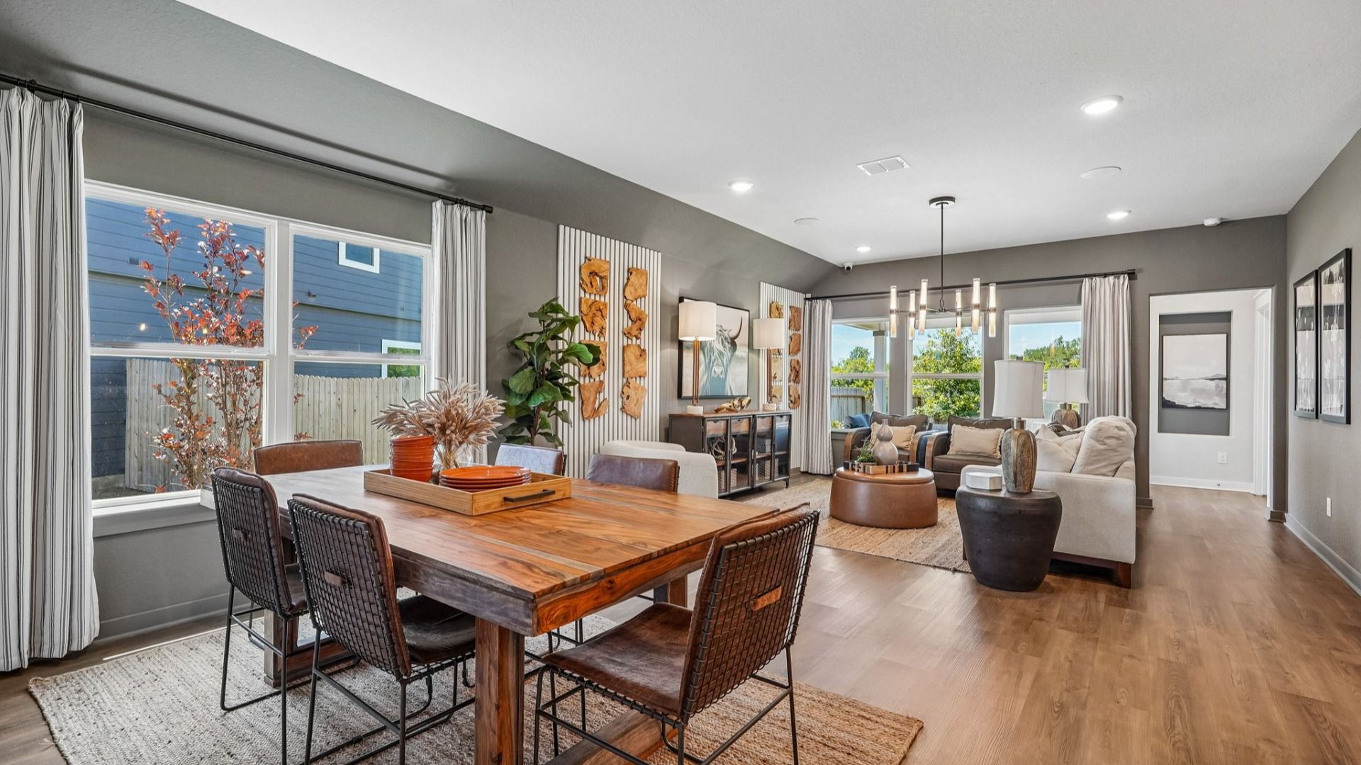 Dining Area opens to the Great Room, with plenty of windows to allow natural light to flow in.