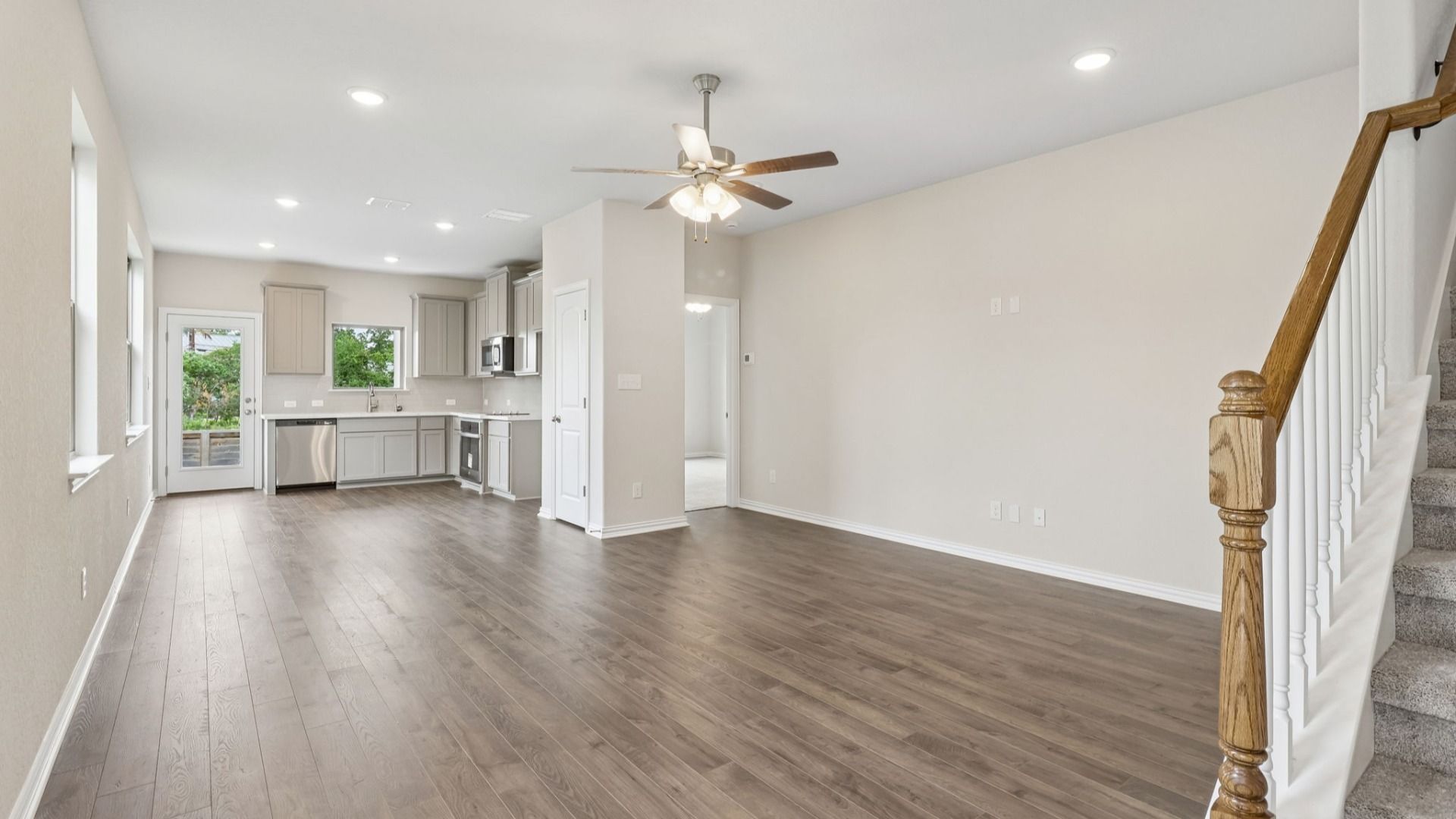 Great Room offers plenty of natural light with many large windows, and is conveniently located near the Kitchen