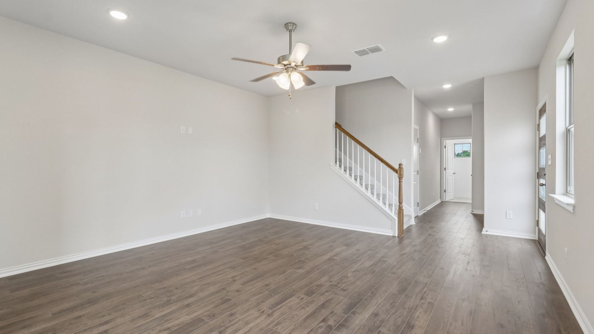 Great Room offers plenty of natural light with many large windows, and is conveniently located near the Kitchen
