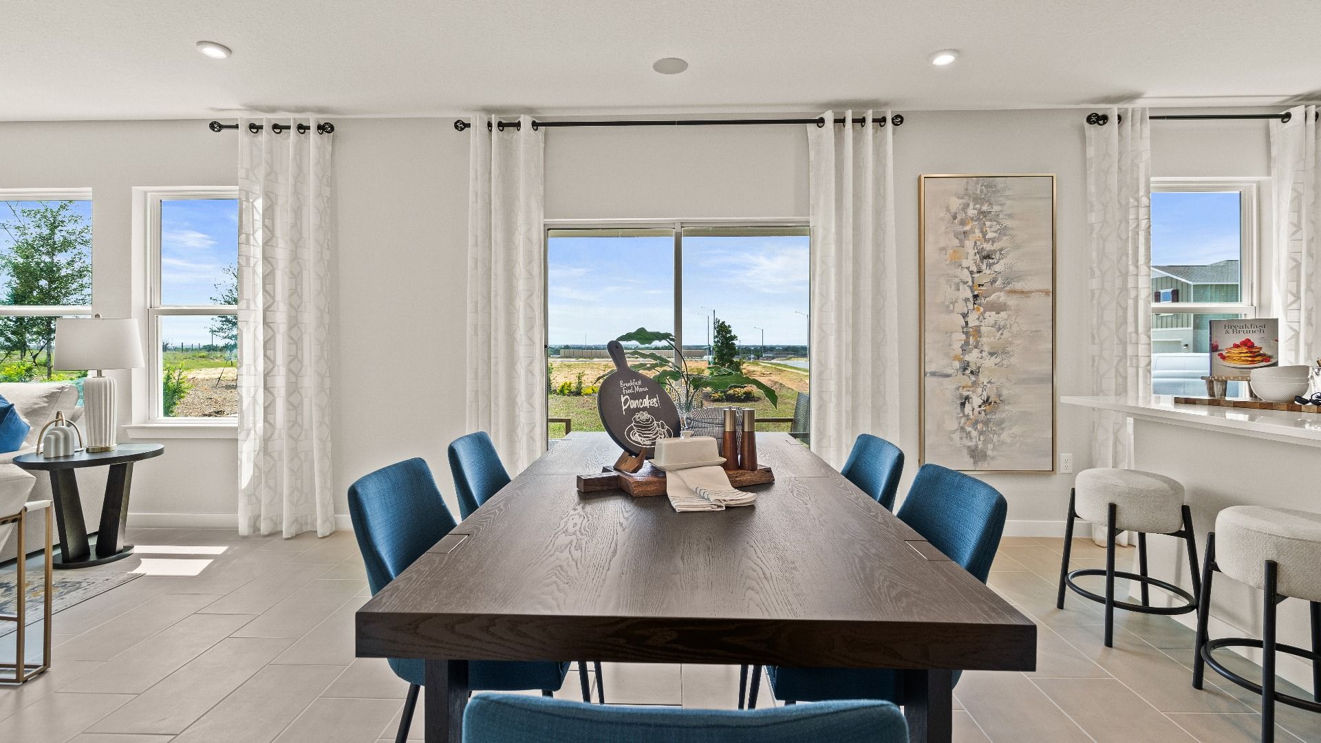 Open Concept Dining Area in New Home in Liberty Trace by DRB Homes in Haines City, FL