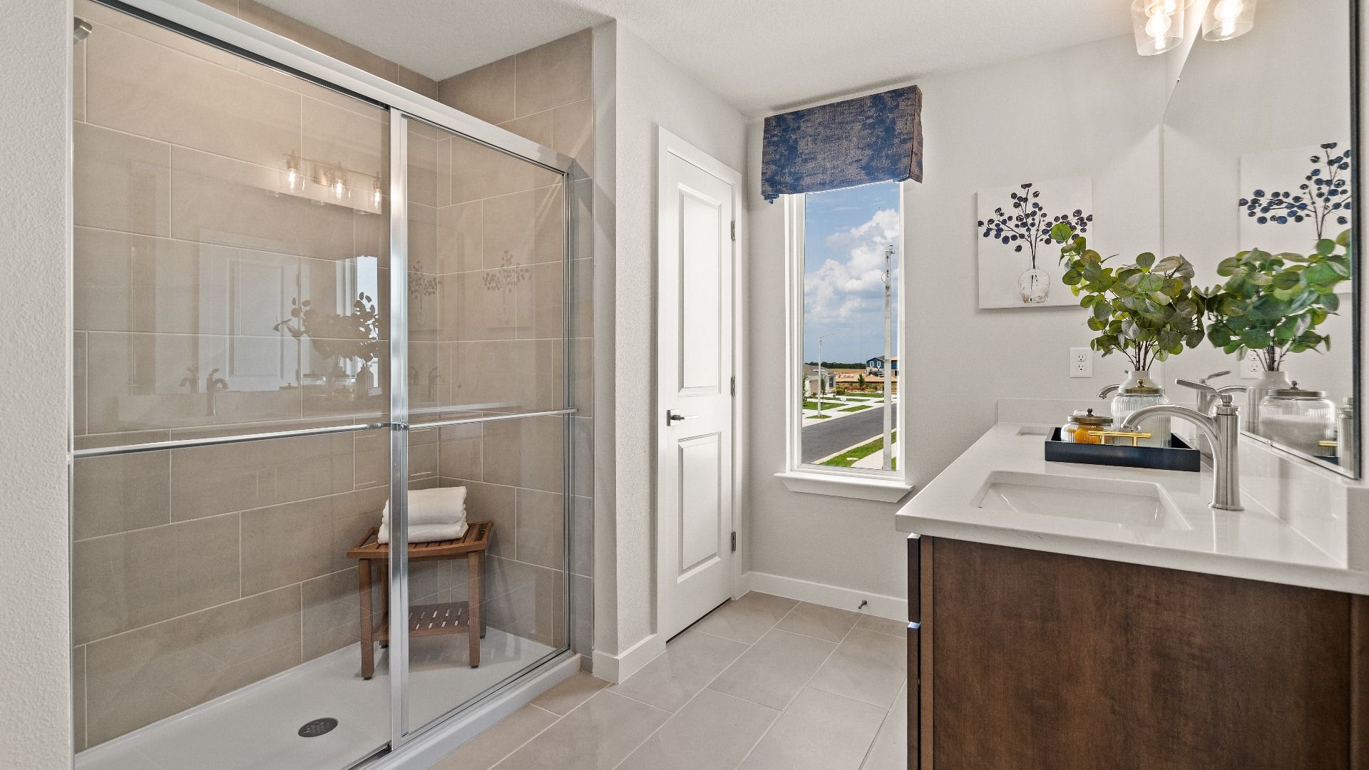 Primary Suite En Suite Bath with Dual Sinks and Premium Fixtures New Home in Liberty Trace by DRB Homes in Haines City, FL