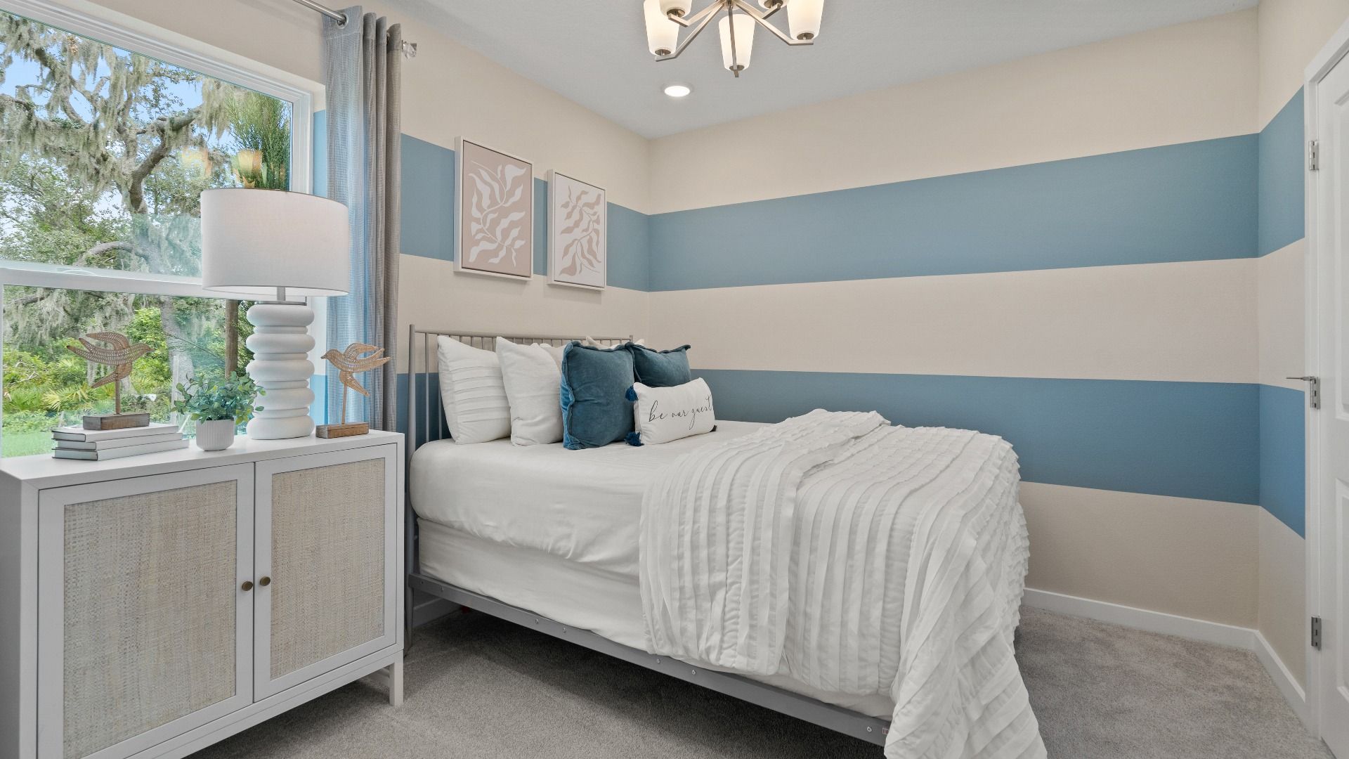 First Floor Guest Room in Ponte Vedra New Home Plan in Hamilton Bluff in Haines City, FL by DRB Homes